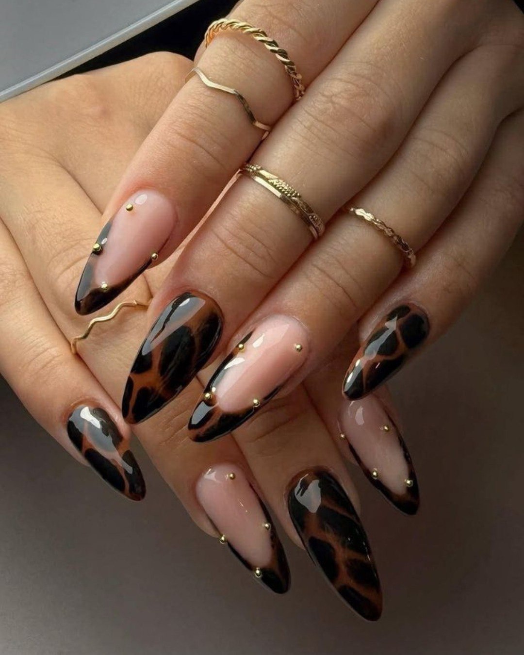 Glossy Tortoiseshell French Tip Almond Nails