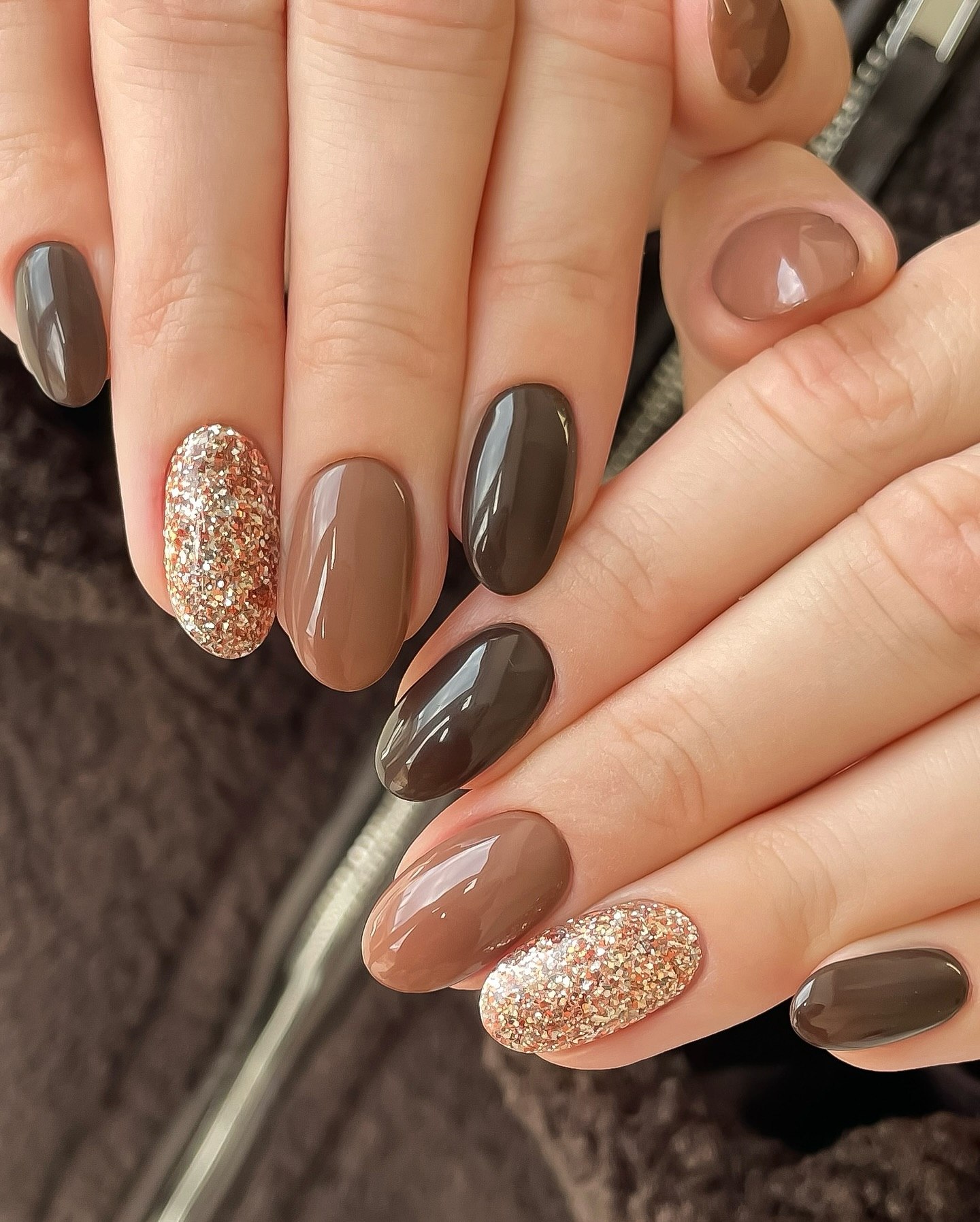 Two-Tone Brown Almond Nails with Rose Gold Glitter