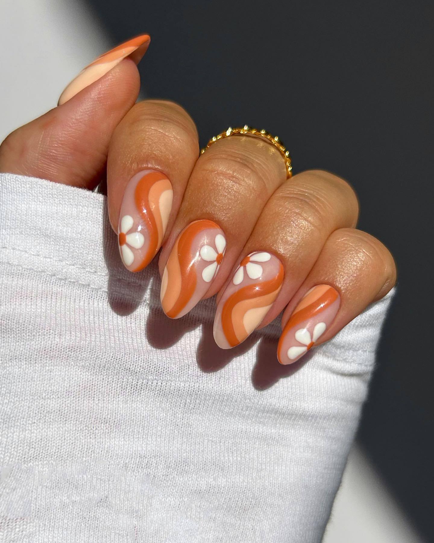 Retro Orange Swirl Daisy Almond Nails