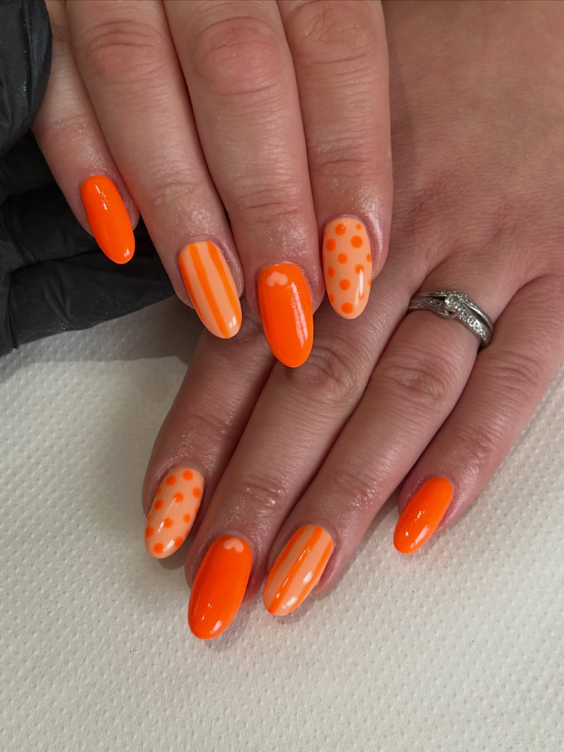 Vibrant Orange Abstract Dot and Stripe Nails