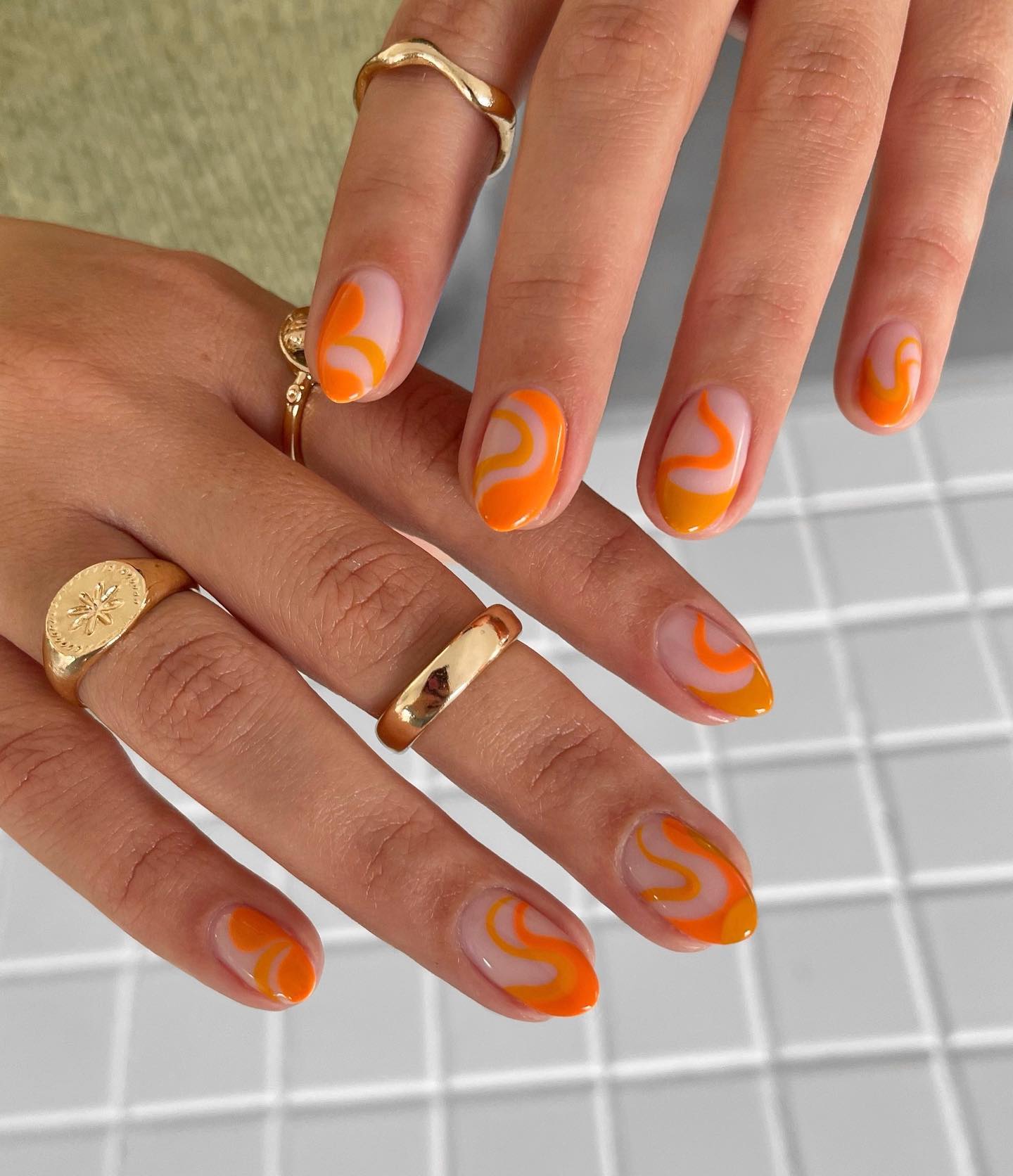 Retro Swirl Orange French Tip Nails