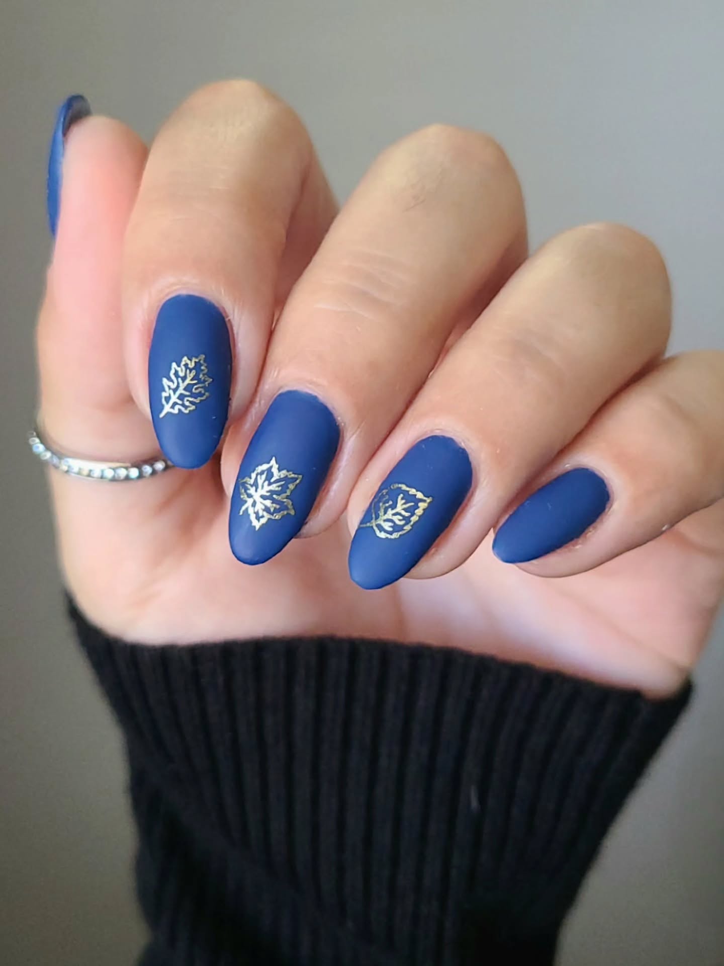 Matte Navy Leaf Stamped Almond Nails