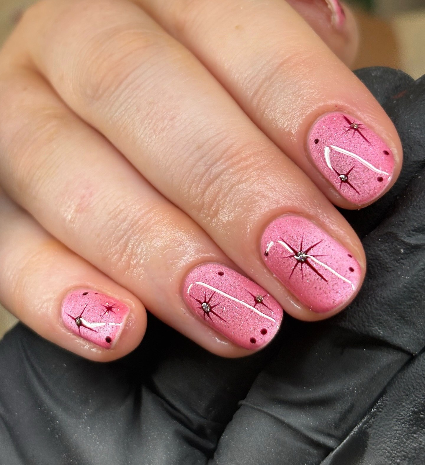 Shimmering Pink Starburst Aura Nails