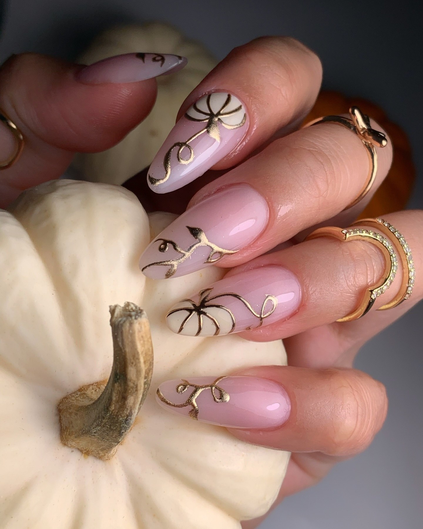 Elegant Pink Pumpkin Swirl Almond Nails