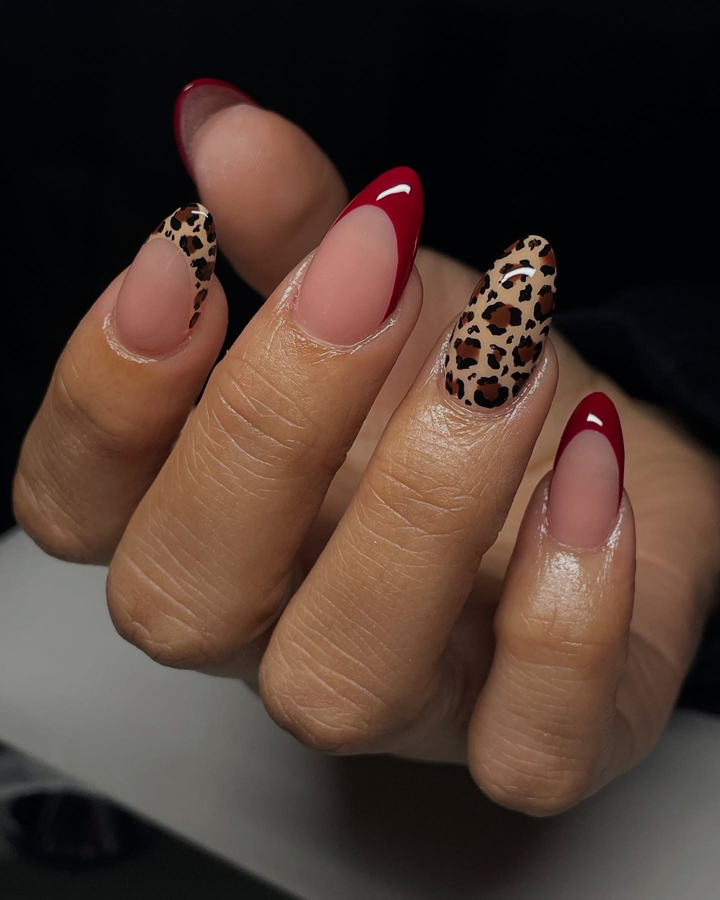 Chic Red French Tips With Leopard Accent Nails