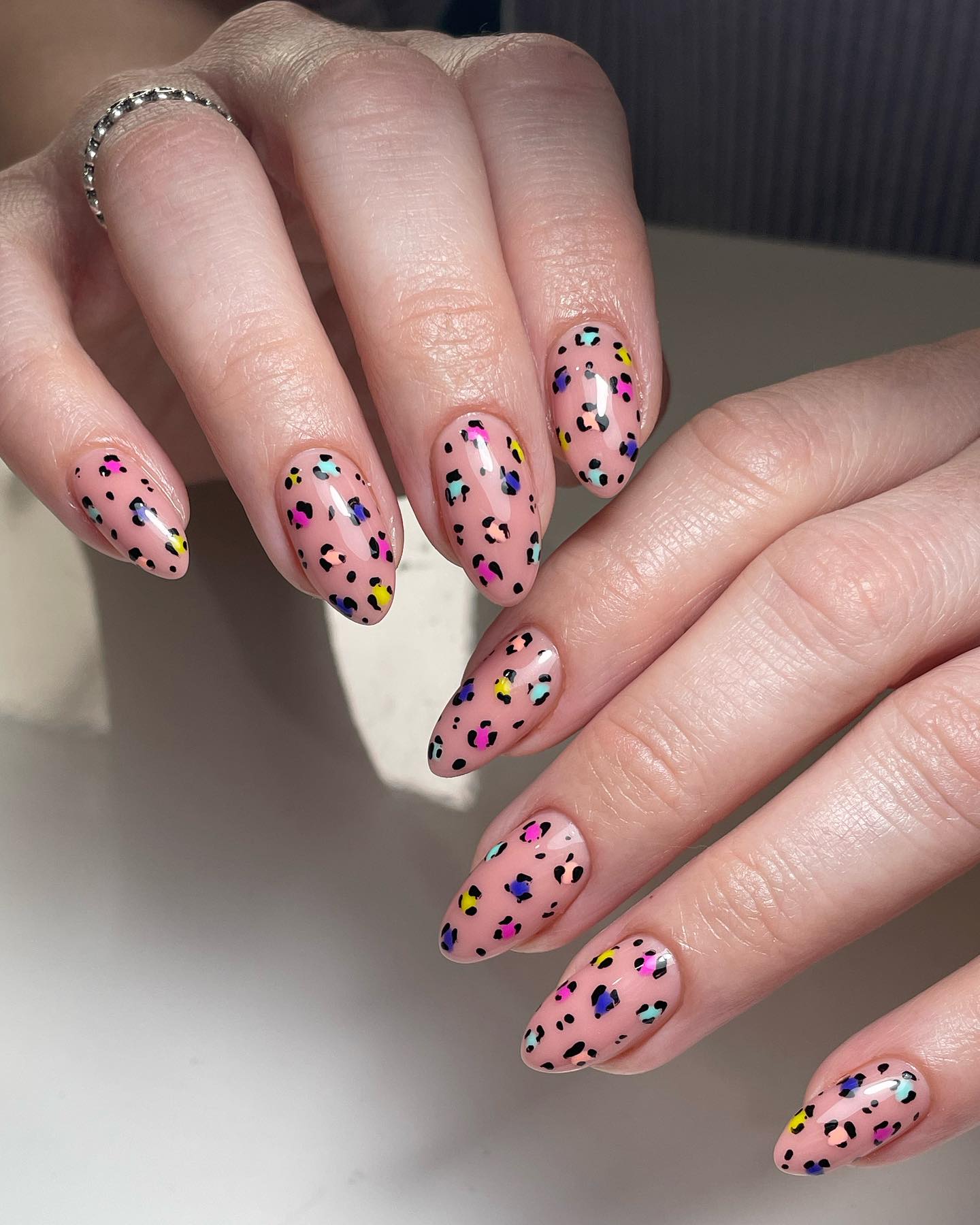 Playful Multicolored Leopard Print Almond Nails