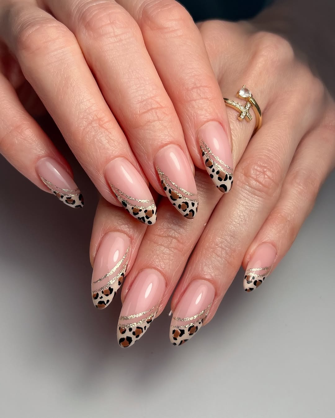 Leopard Print French Tip Almond Nails with Gold Glitter