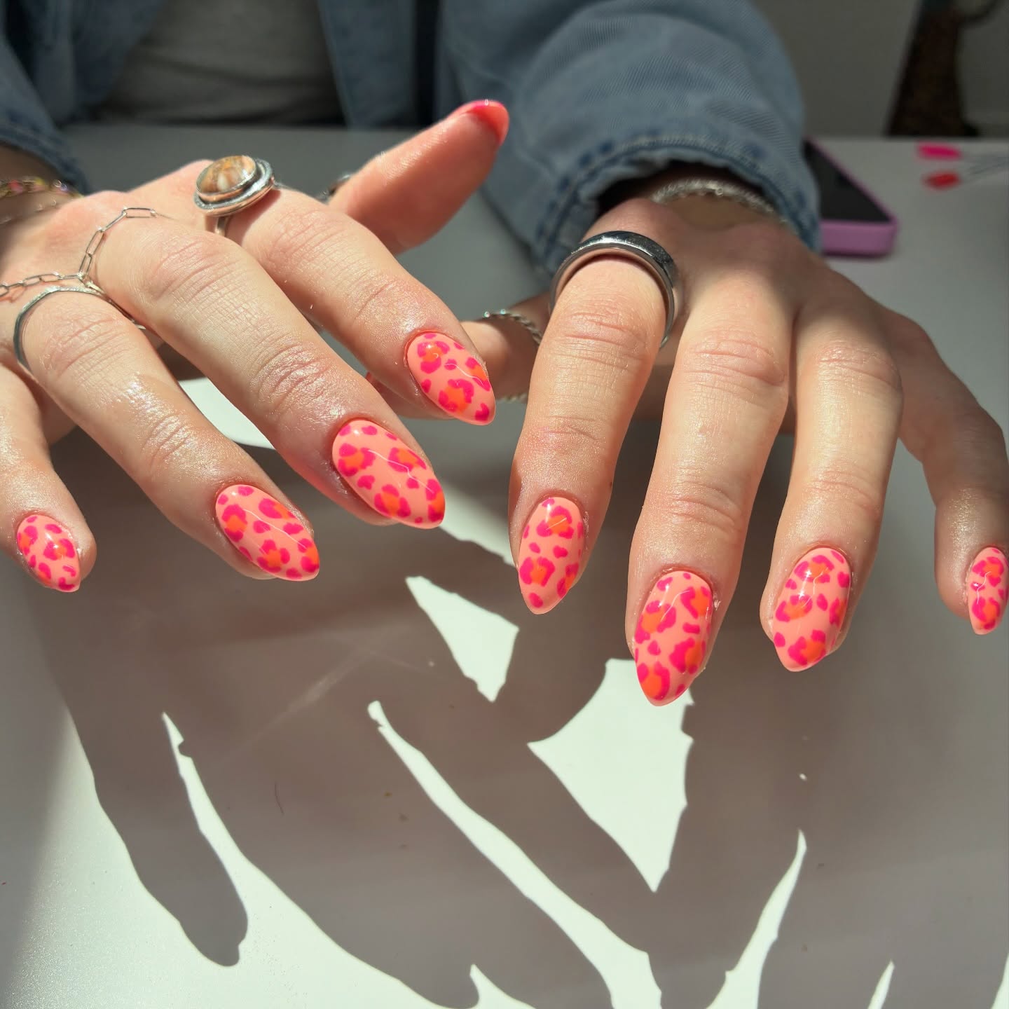 Vibrant Neon Leopard Print Almond Nails