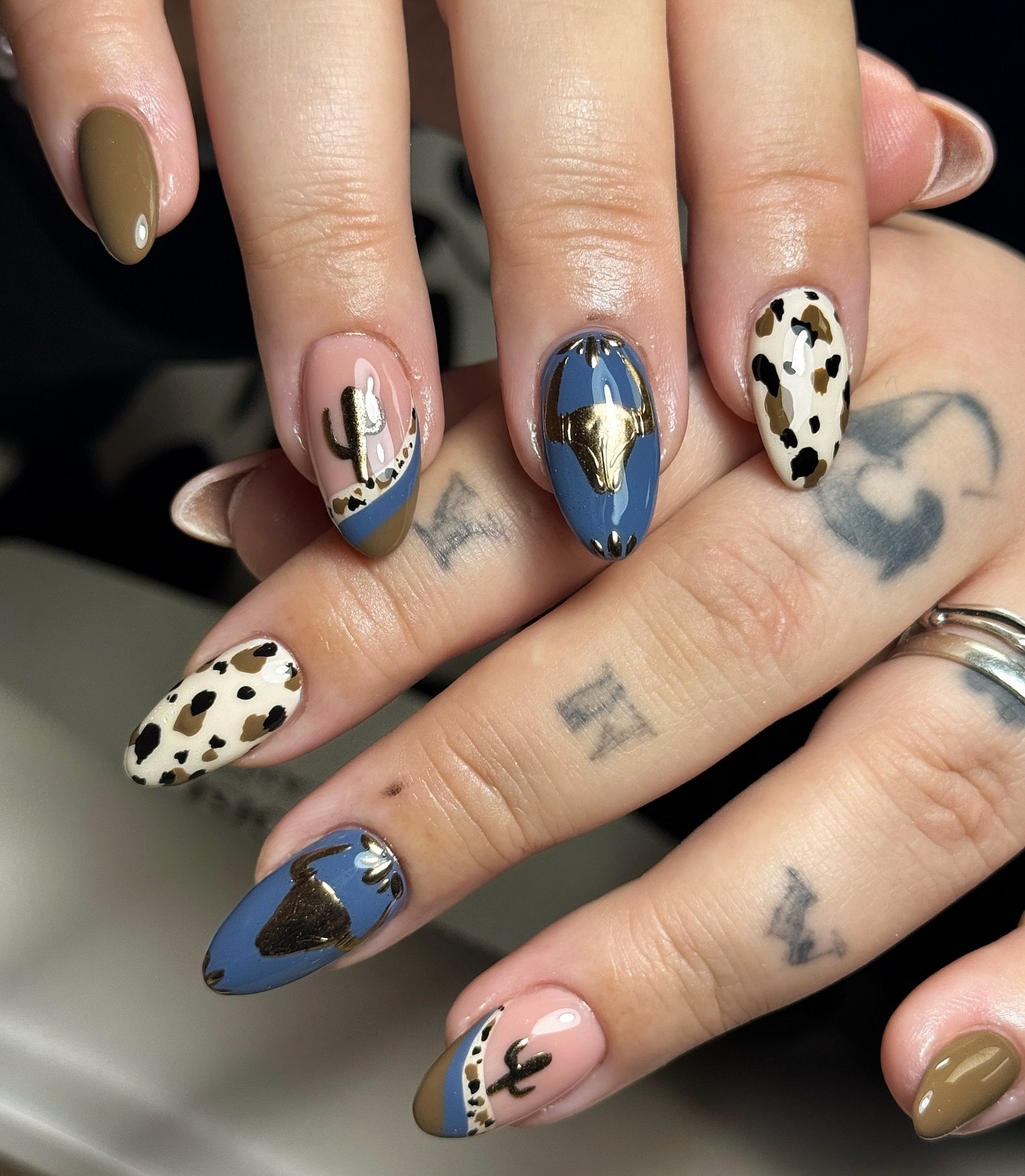 Cow Print and Cactus Almond Nails