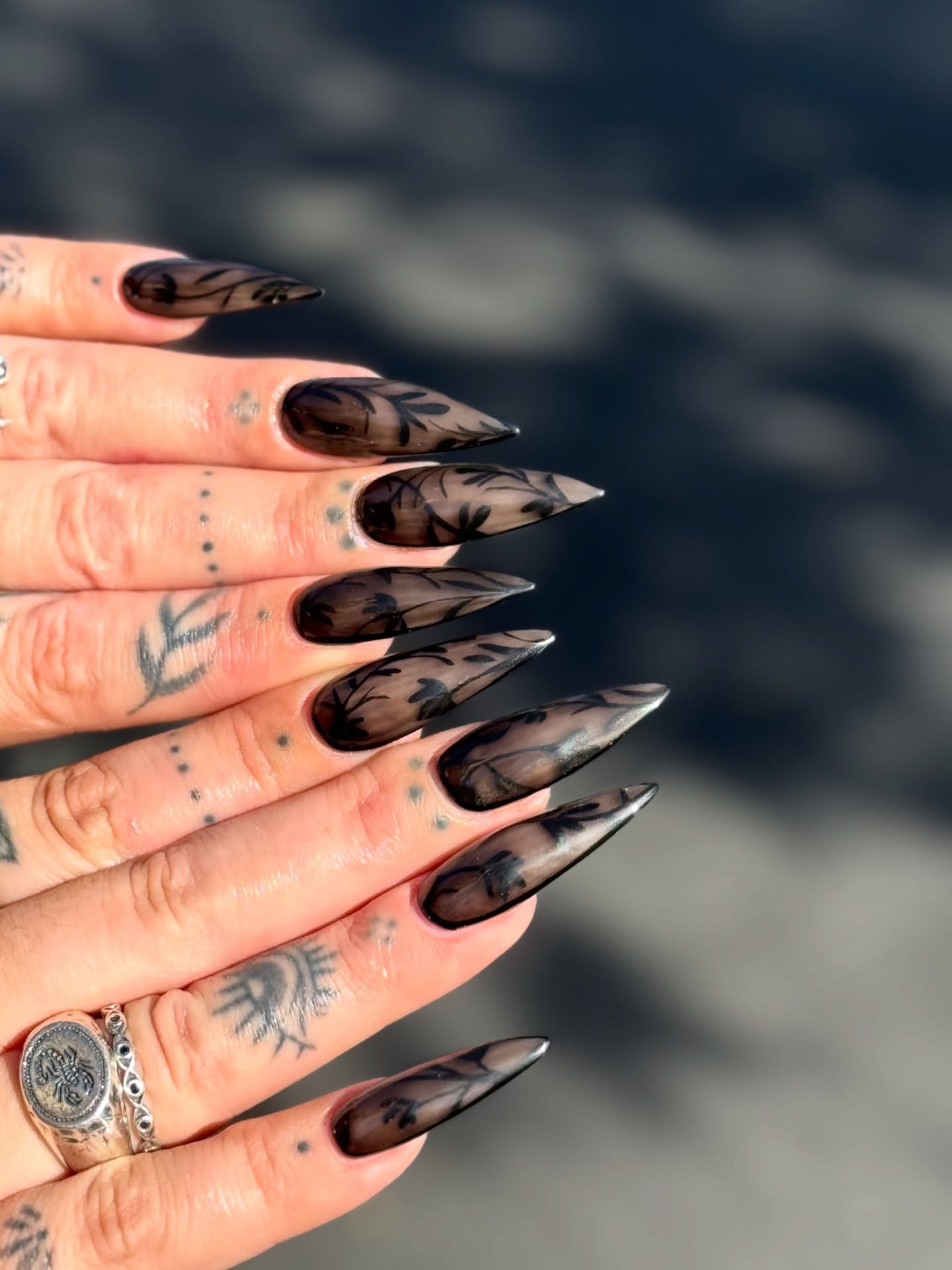 Sheer Black Floral Stiletto Nails