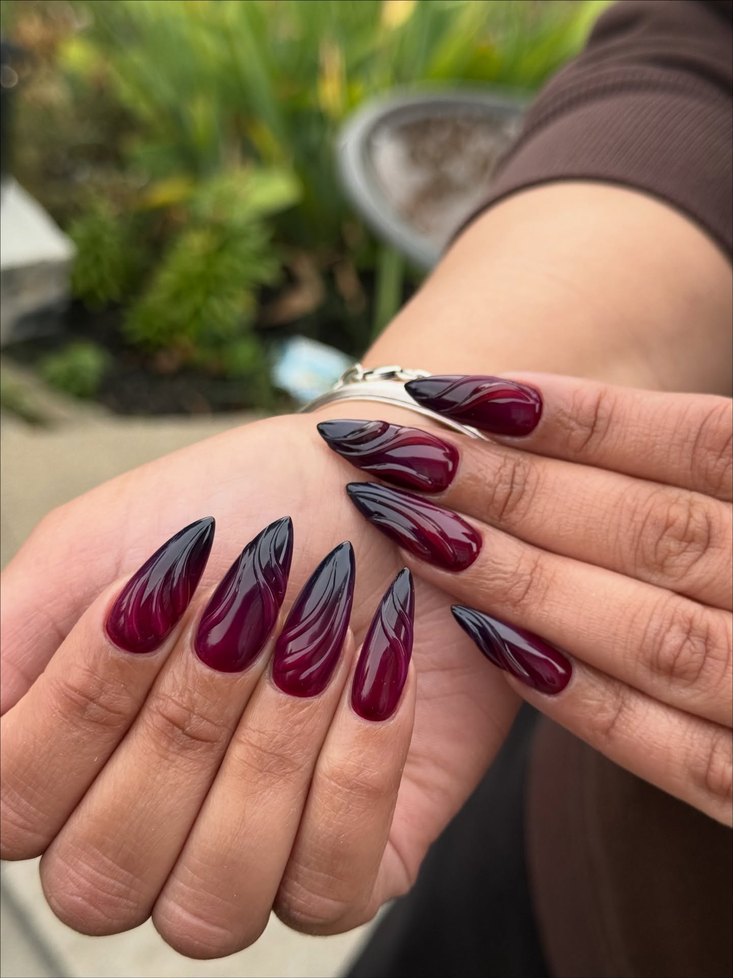 Deep Plum and Black Ombre Swirl Stiletto Nails