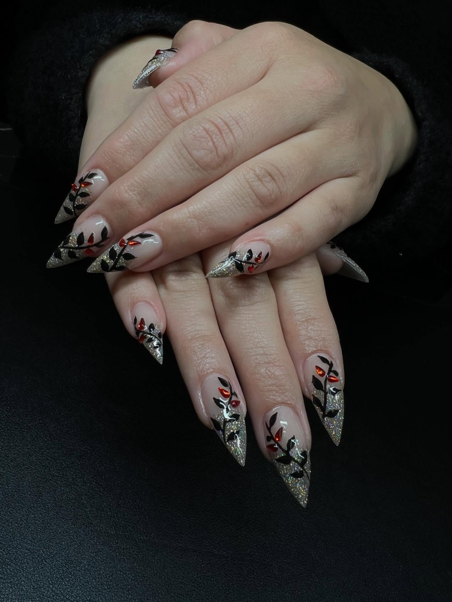 Gothic Floral Stiletto Nails with Red Accents