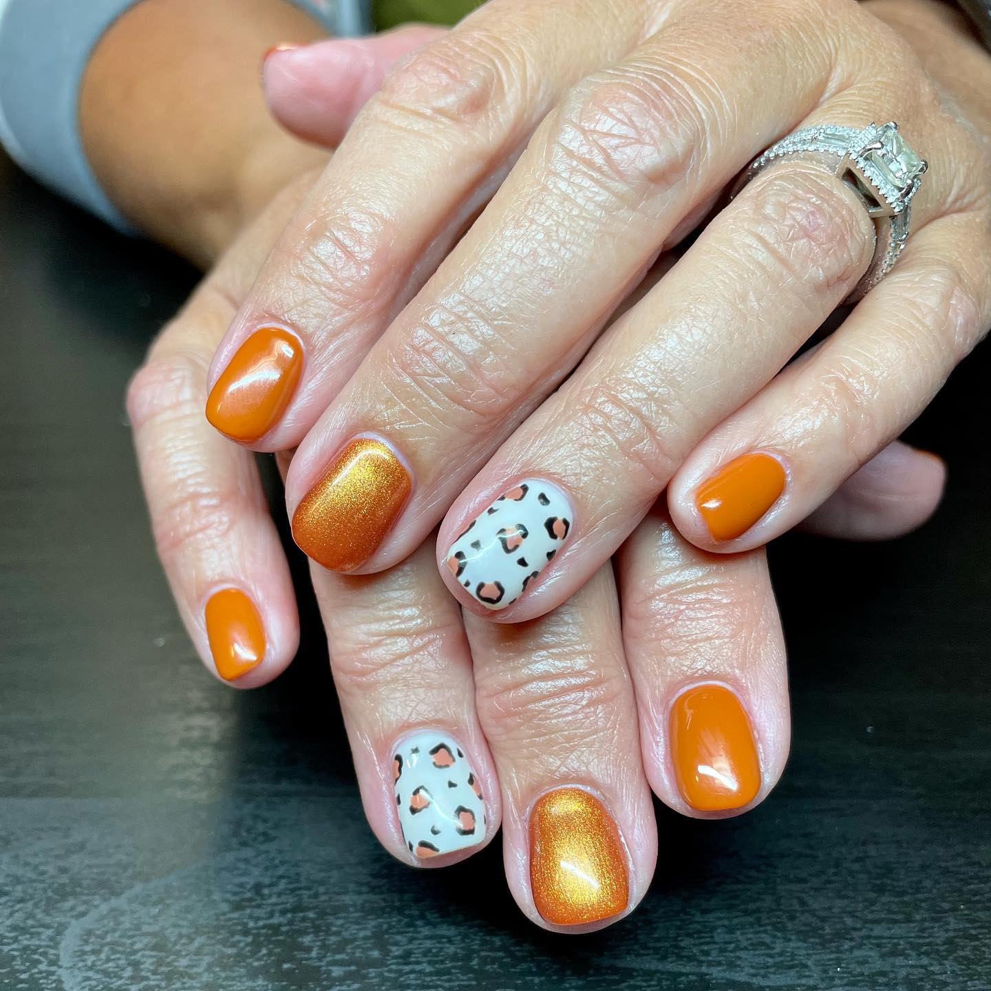 Glossy Orange & Shimmer Cheetah Accent Nails