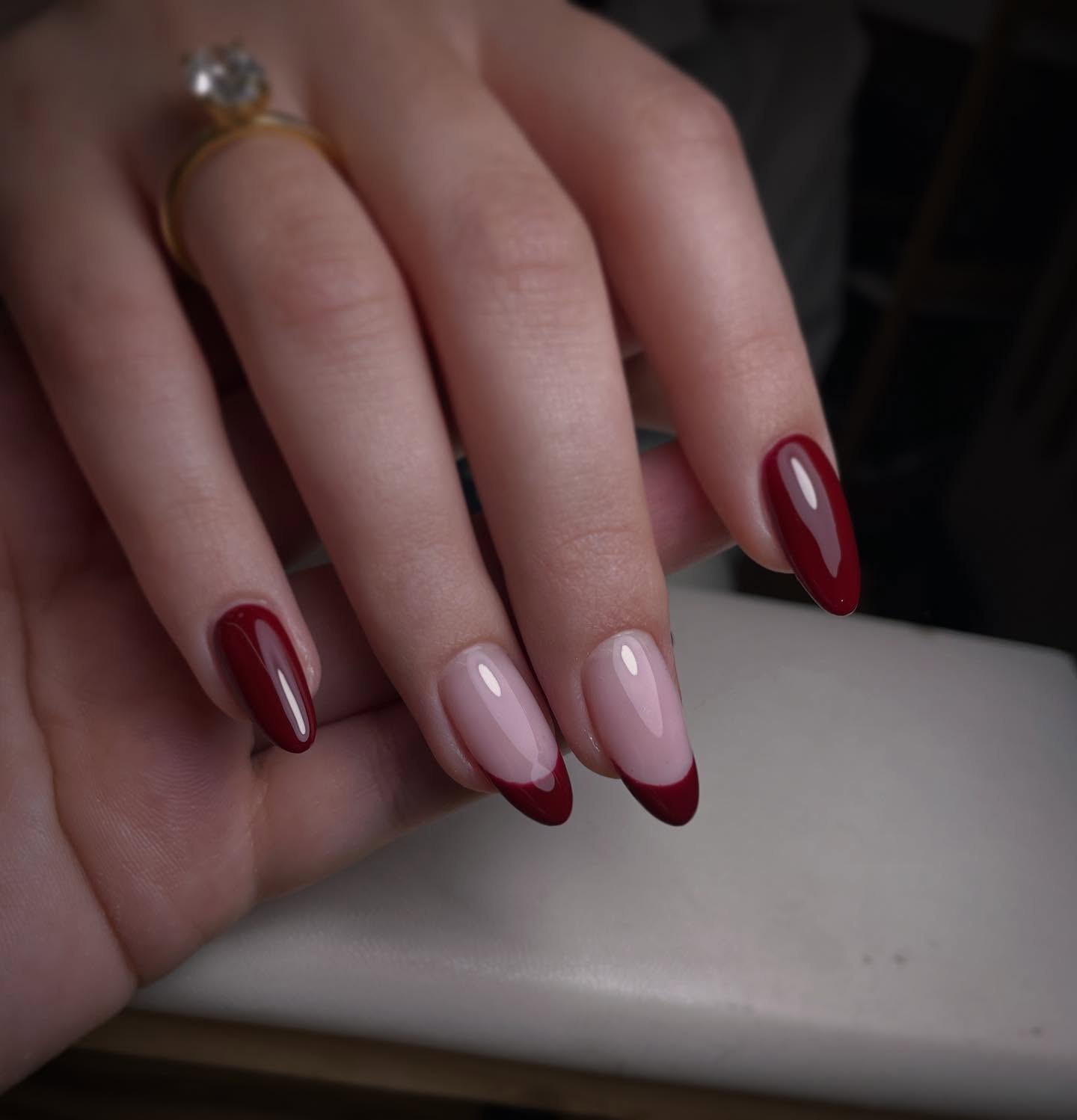 Glossy Deep Burgundy French Almond Nails