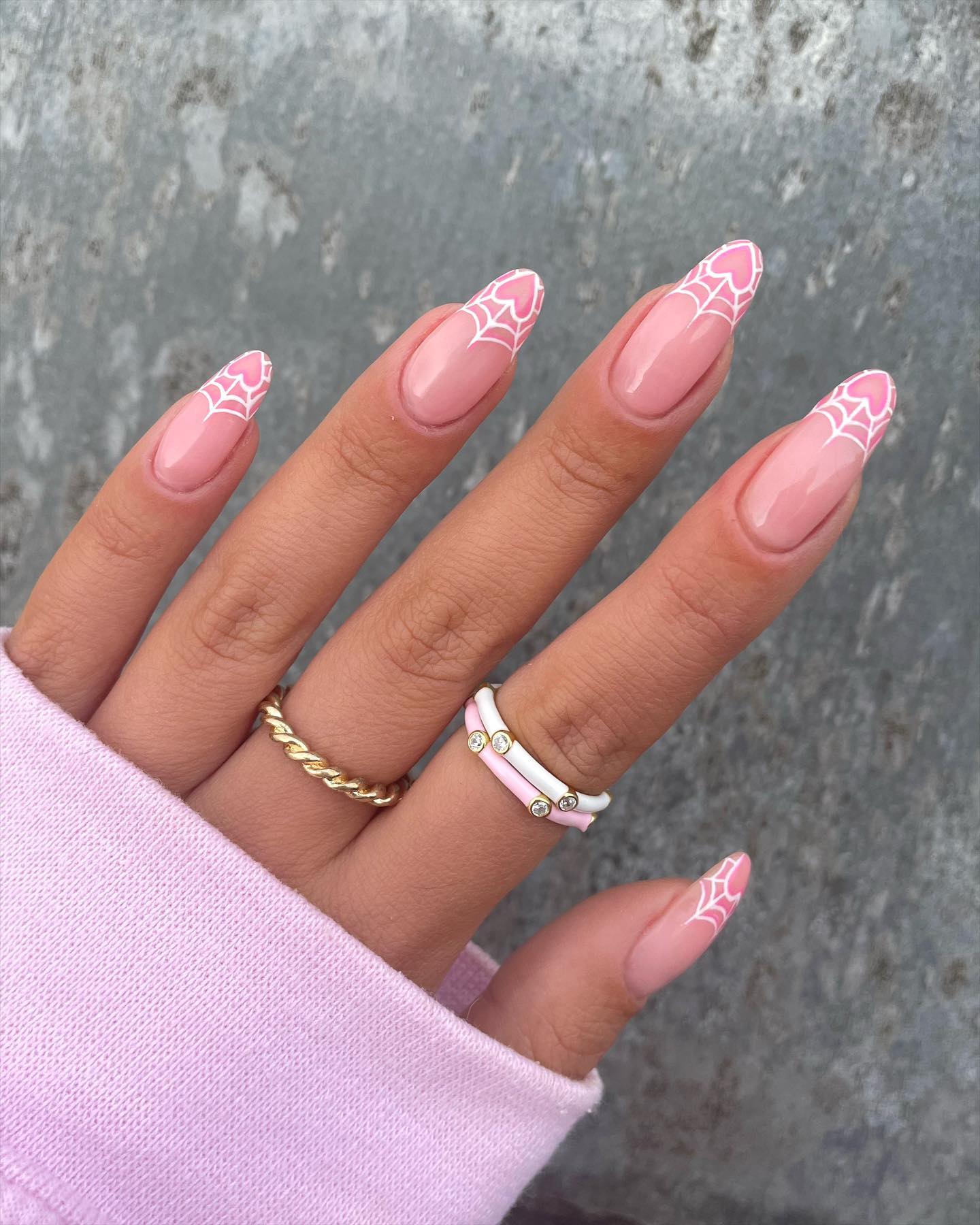 Pink French Spiderweb Almond Nails