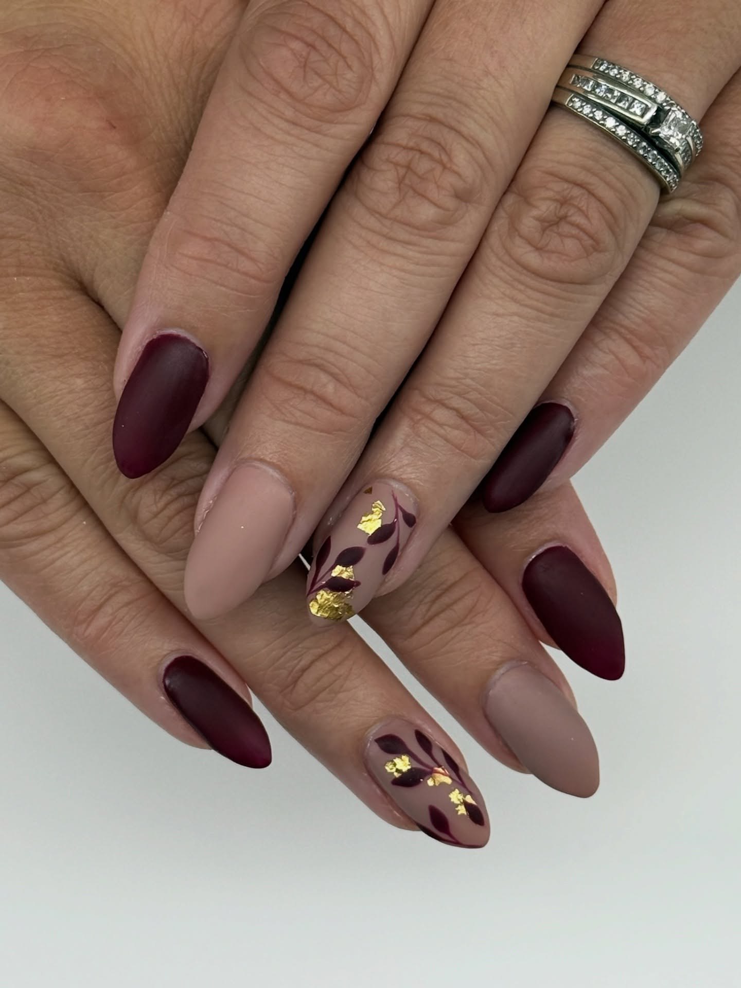 Matte Burgundy and Nude Leaf Accent Nails