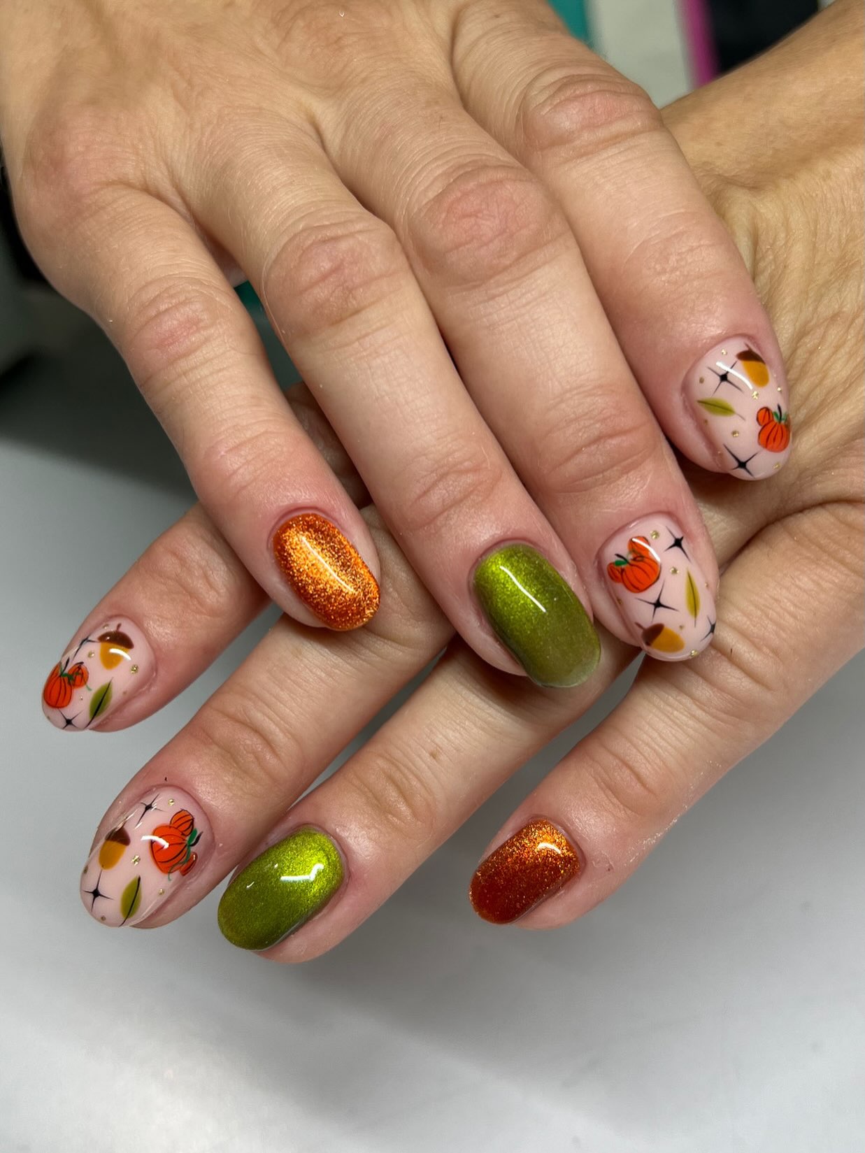 Pumpkin Spice Glitter and Green Ombre Nails