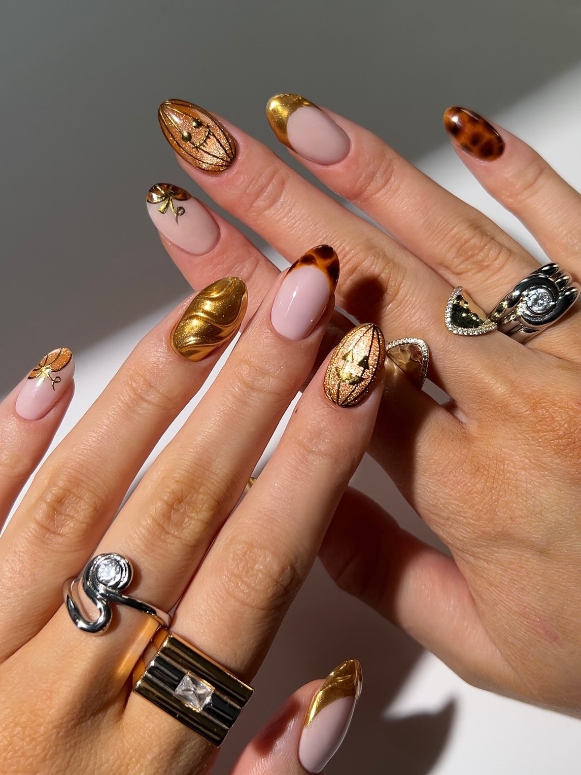 Glamorous Gold Tortoiseshell Almond Nails
