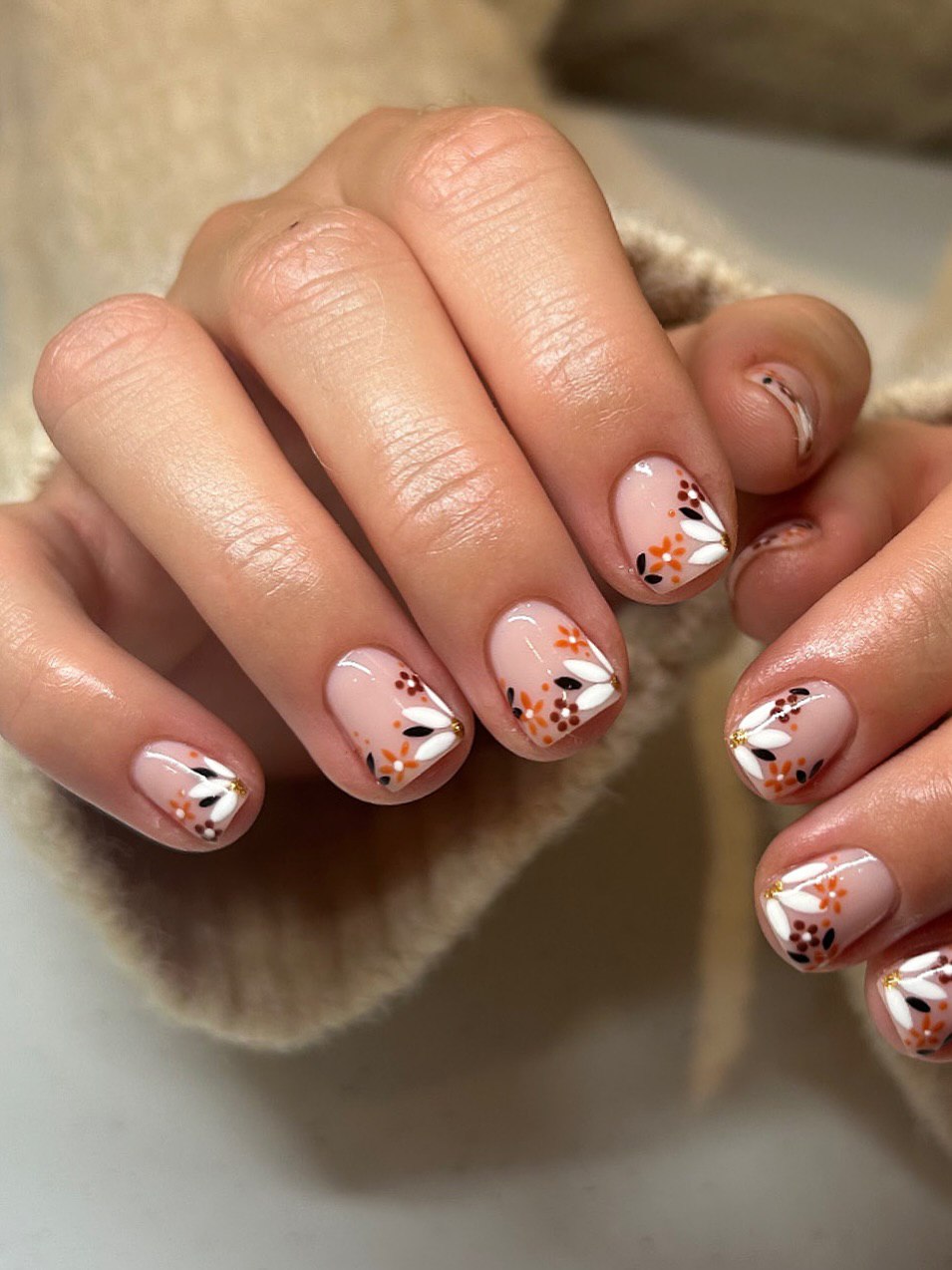 Glossy Nude Floral French Tip Manicure