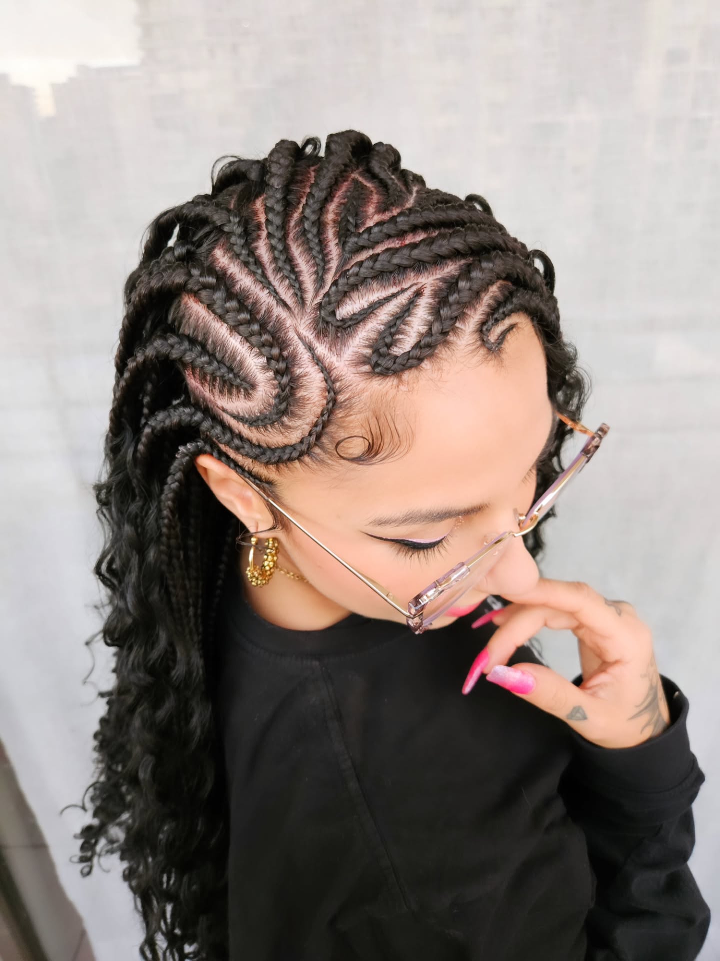 Intricate Tribal Braids With Loose Waves