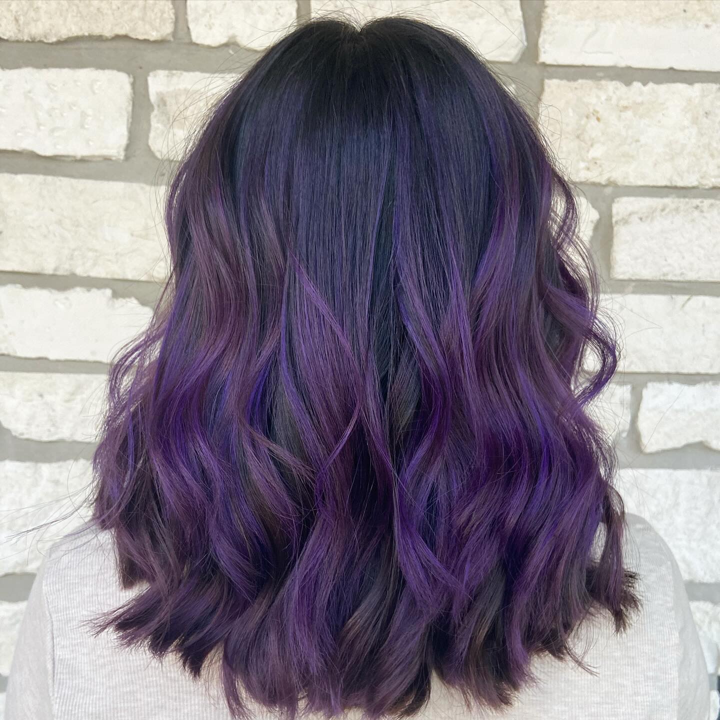 Deep Plum Balayage With Soft Waves