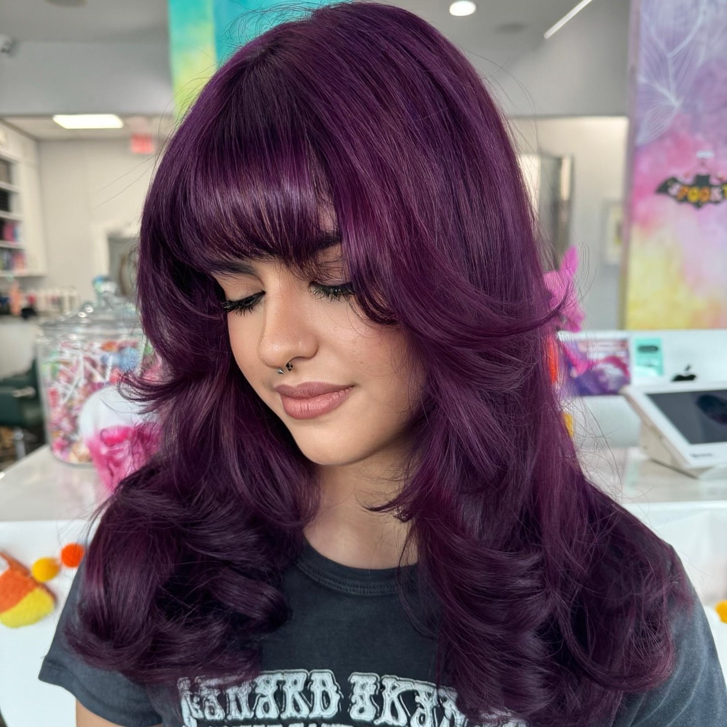 Voluminous Plum Layers With Wispy Bangs
