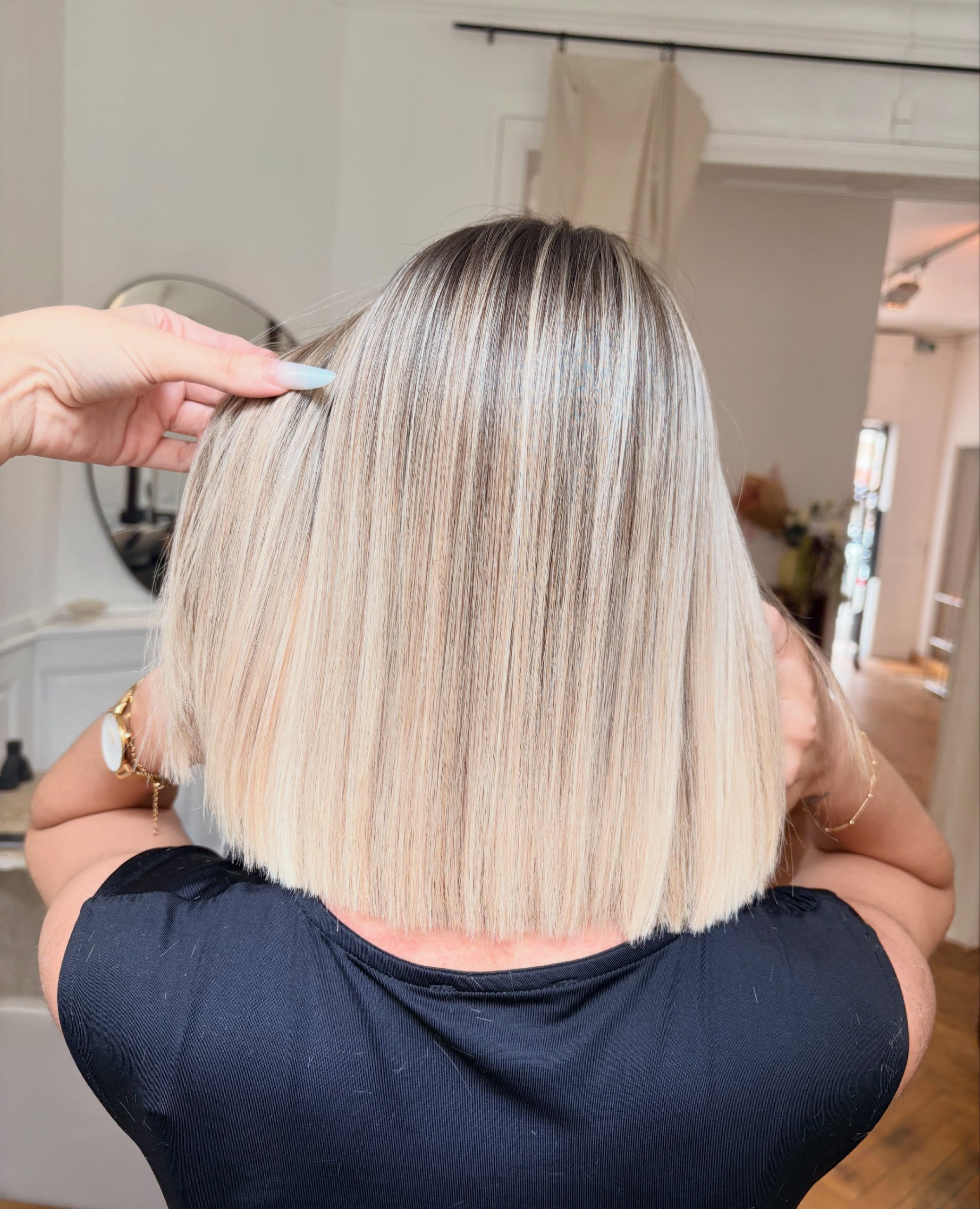 Sleek Platinum Blonde Blunt Cut Bob