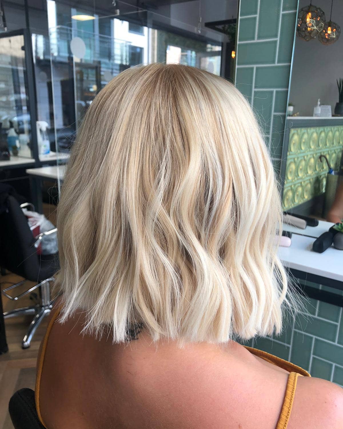 Platinum Blonde Textured Bob With Loose Waves