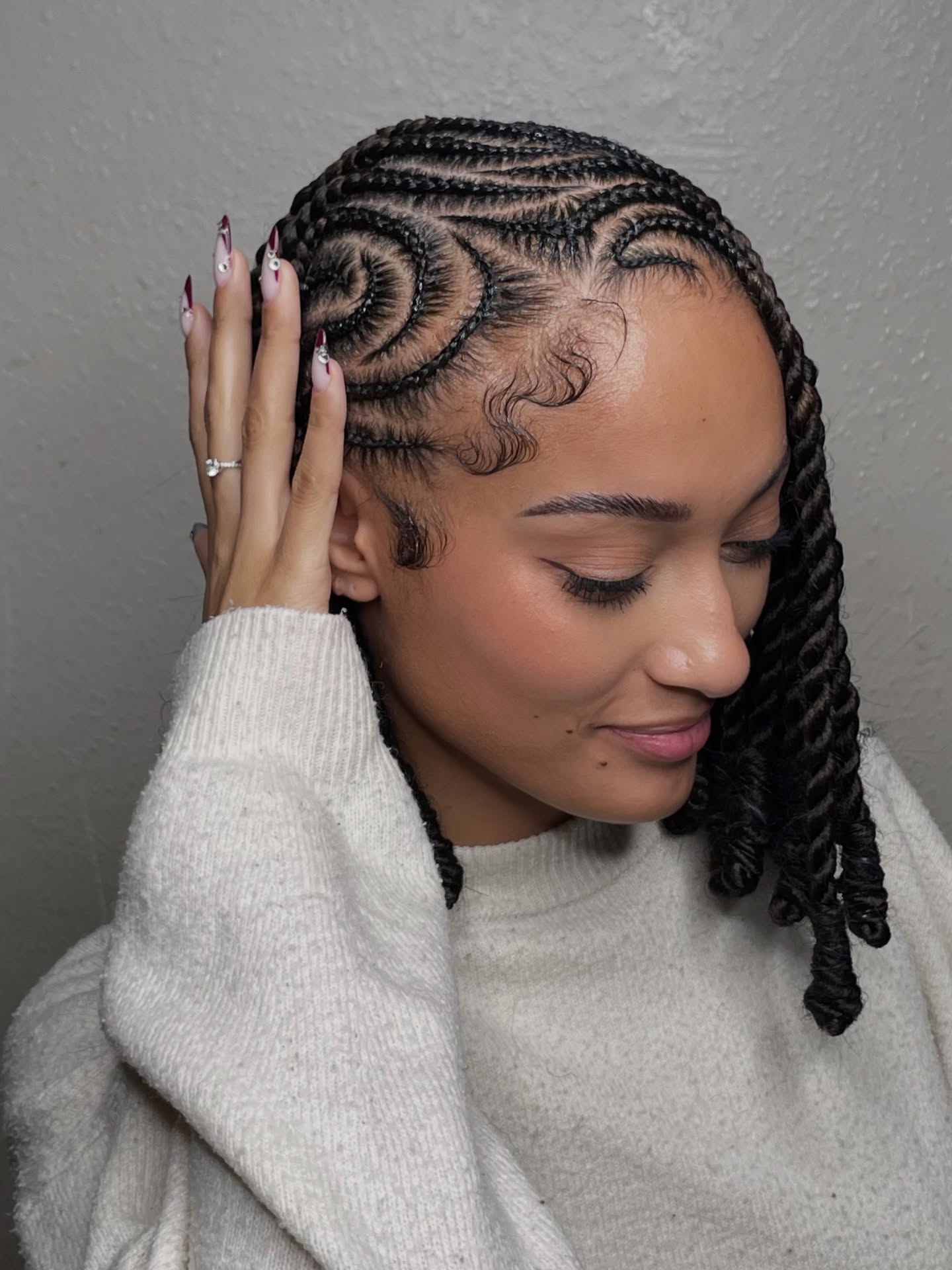 Intricate Cornrow Designs With Defined Twists