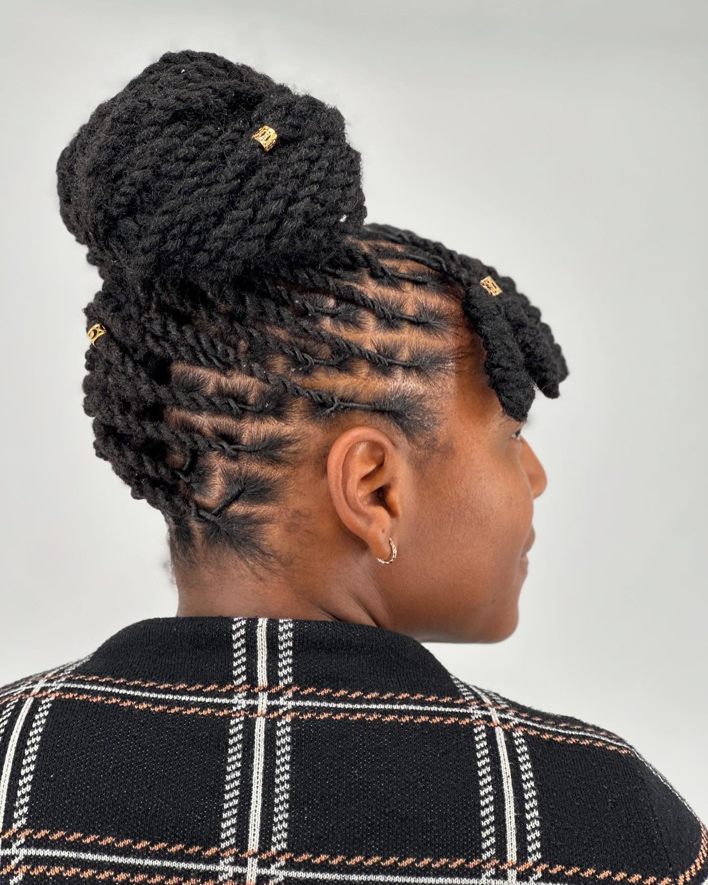 Chic Twisted Locs High Bun With Gold Embellishments