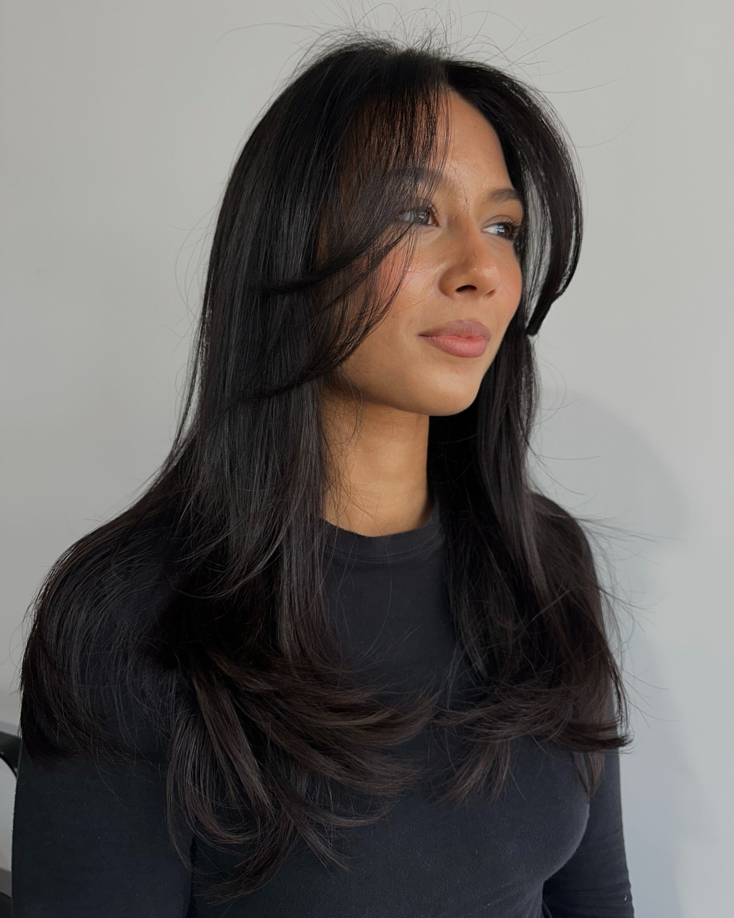 Soft Layered Cut With Face-Framing Bangs