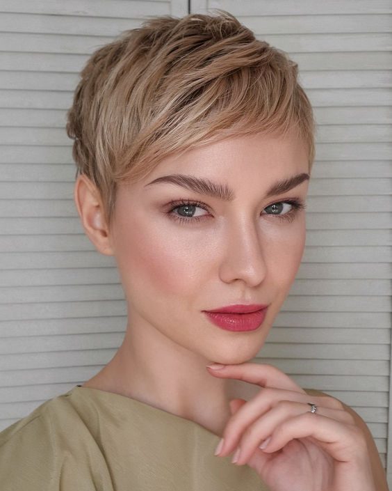 Tousled Pixie Cut With Honey Blonde Highlights