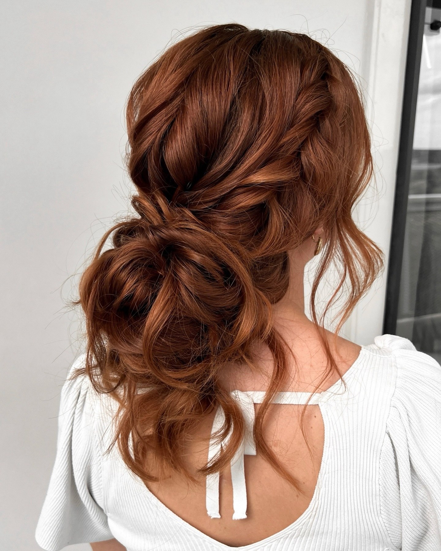 Textured Messy Low Chignon On Copper Waves