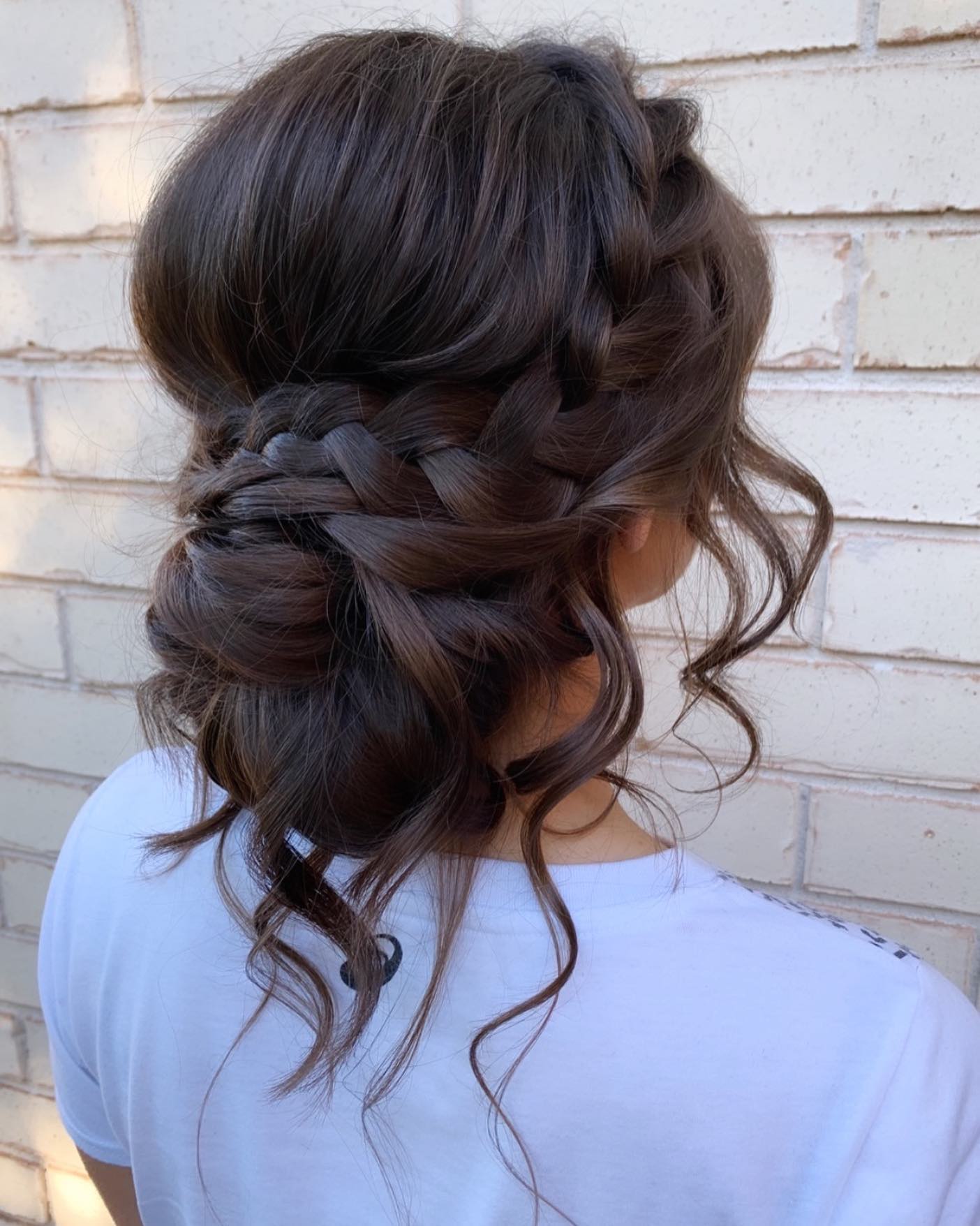 Textured Braided Low Bun For Long Hair