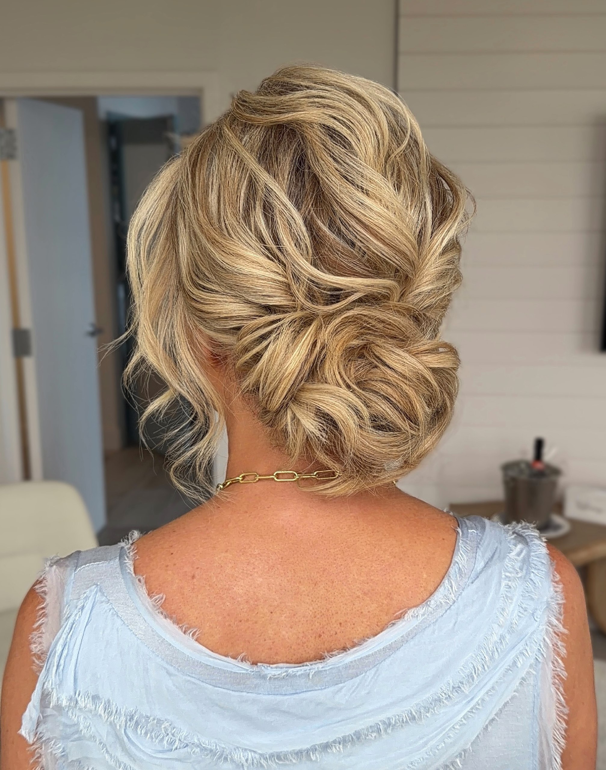 Textured Low Chignon With Romantic Face Framing Pieces