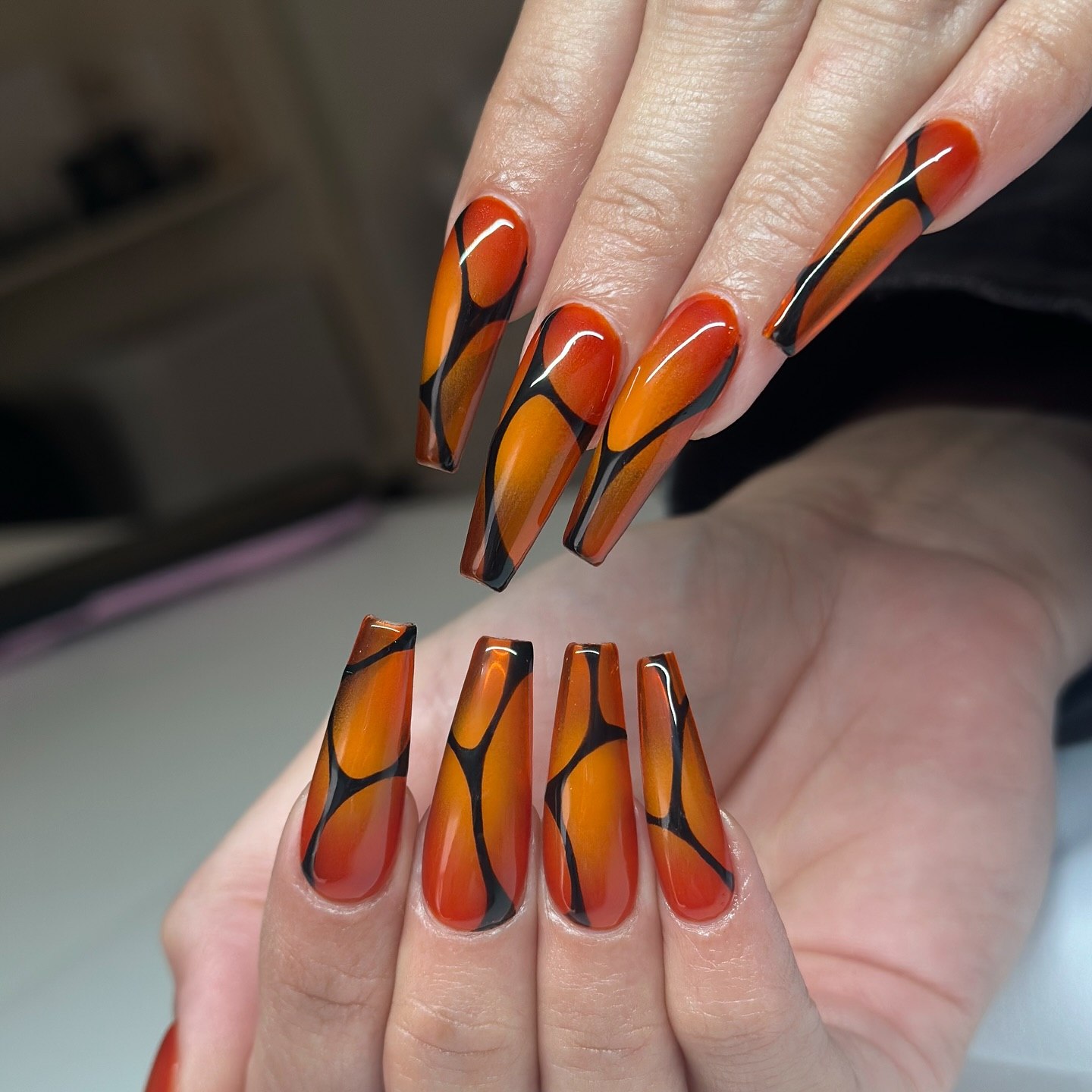 Glossy Orange And Black Stained Glass Coffin Nails
