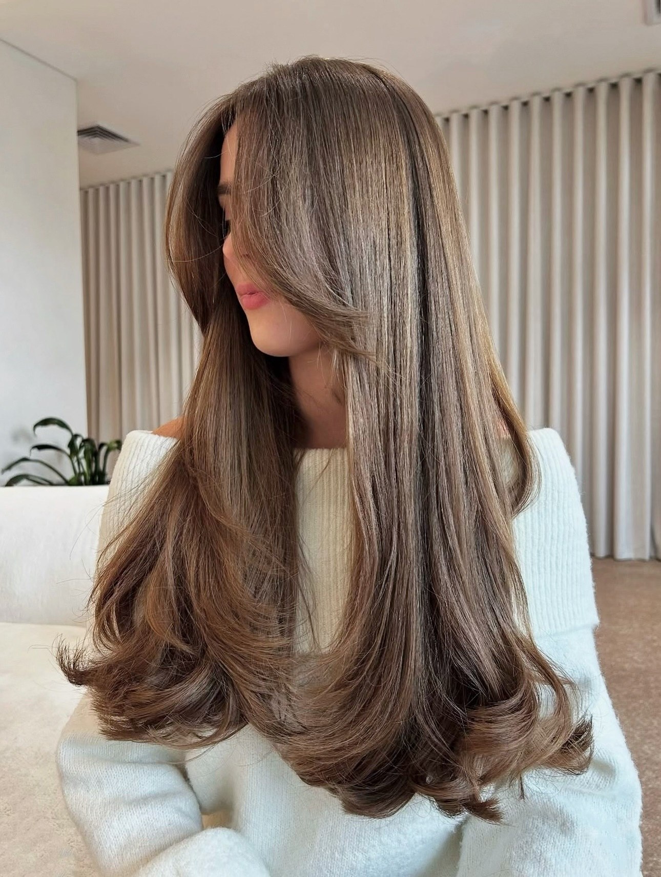 Long Layers With Voluminous Face Framing Curtain Bangs