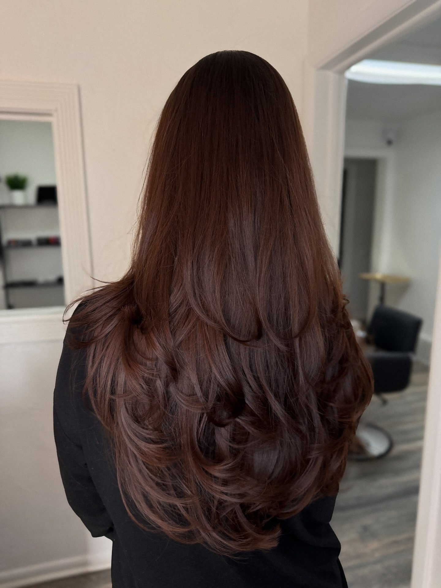Cascading Butterfly Layers On Deep Espresso Long Hair