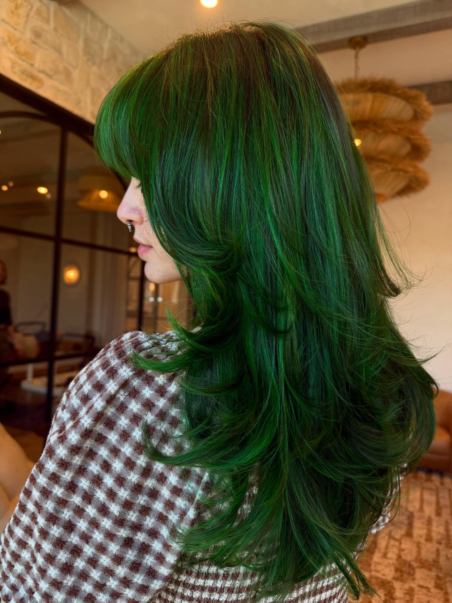 Vibrant Emerald Green Layers With Curtain Bangs