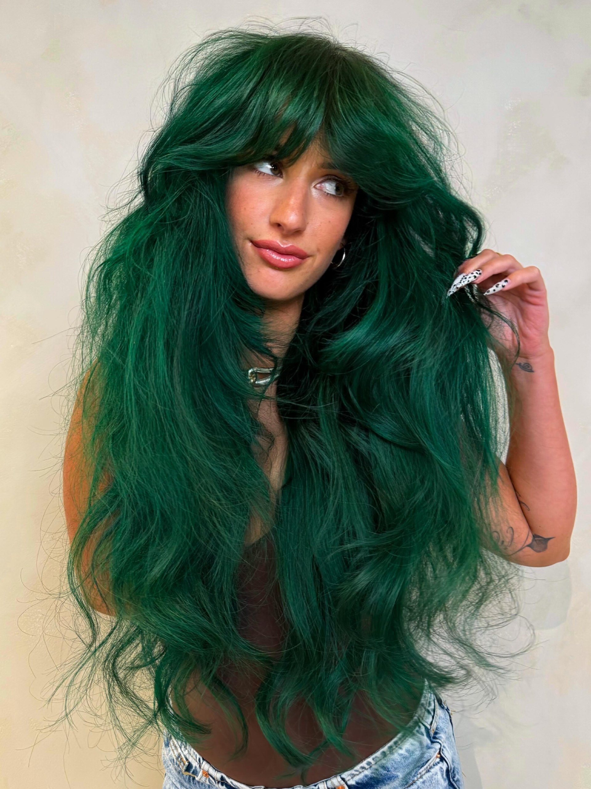 Voluminous Shag Cut With Vibrant Emerald Green Color
