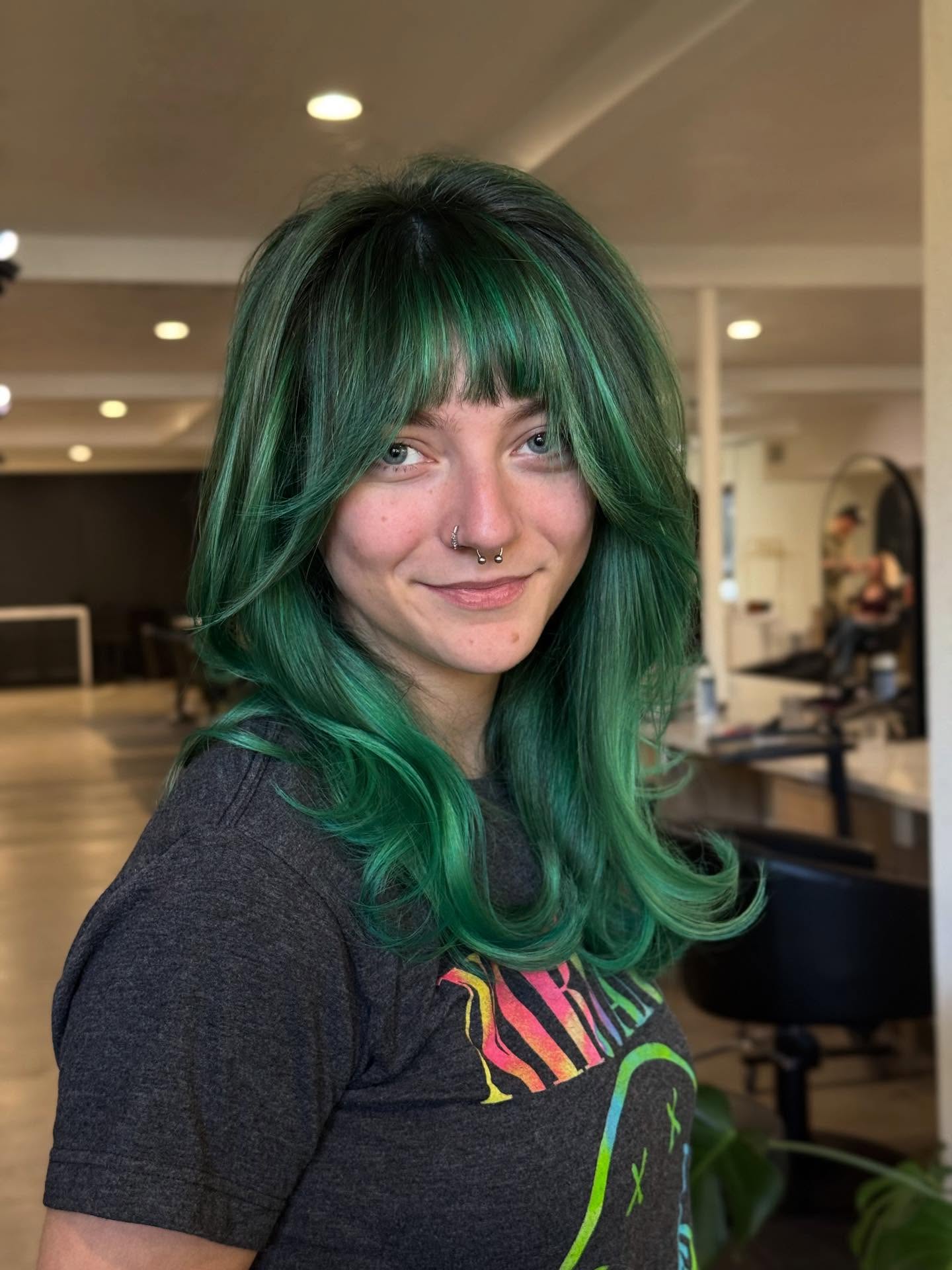 Emerald Green Layered Cut With Wispy Bangs