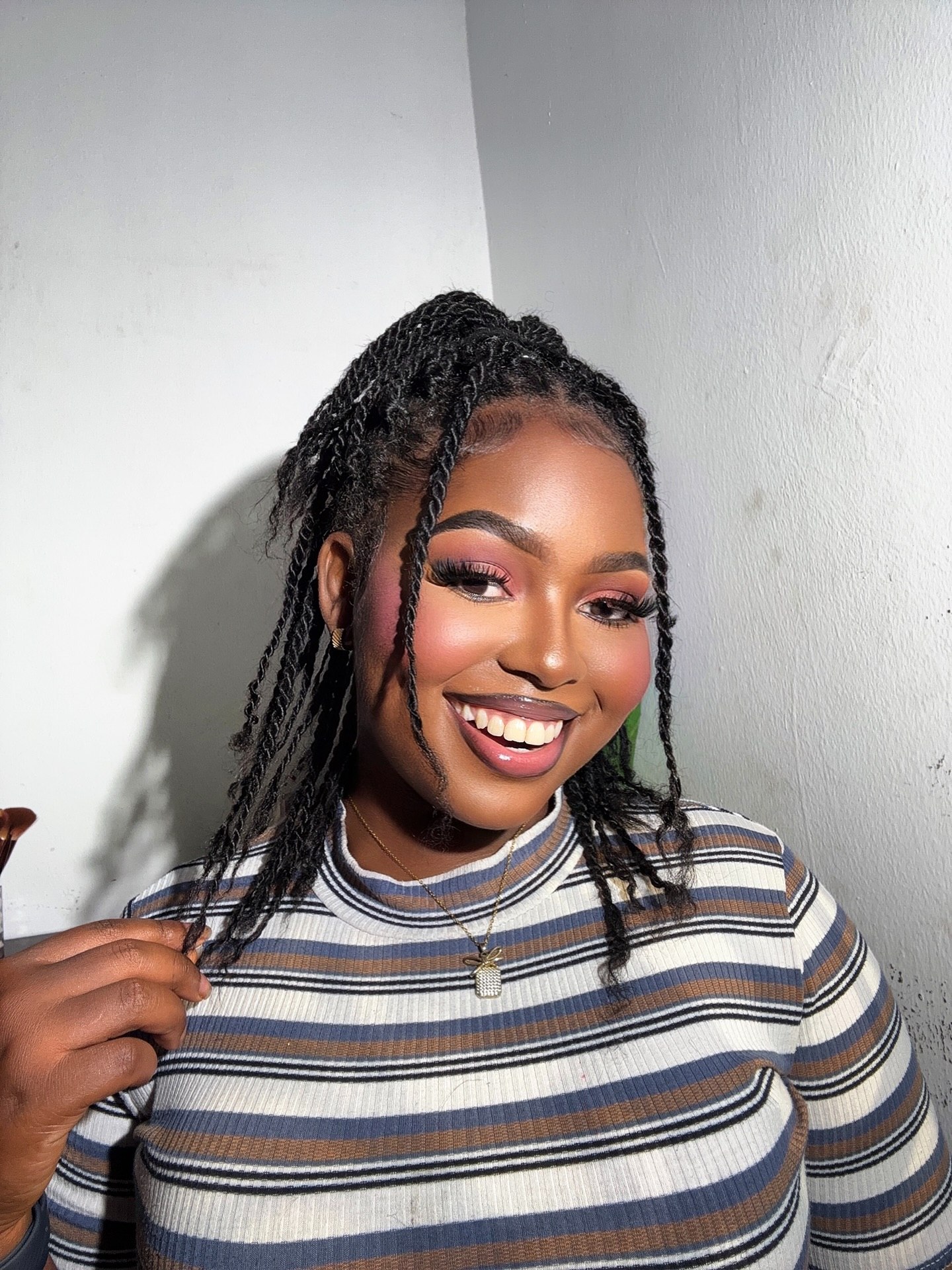 Half Up Kinky Twist With Face Framing Tendrils