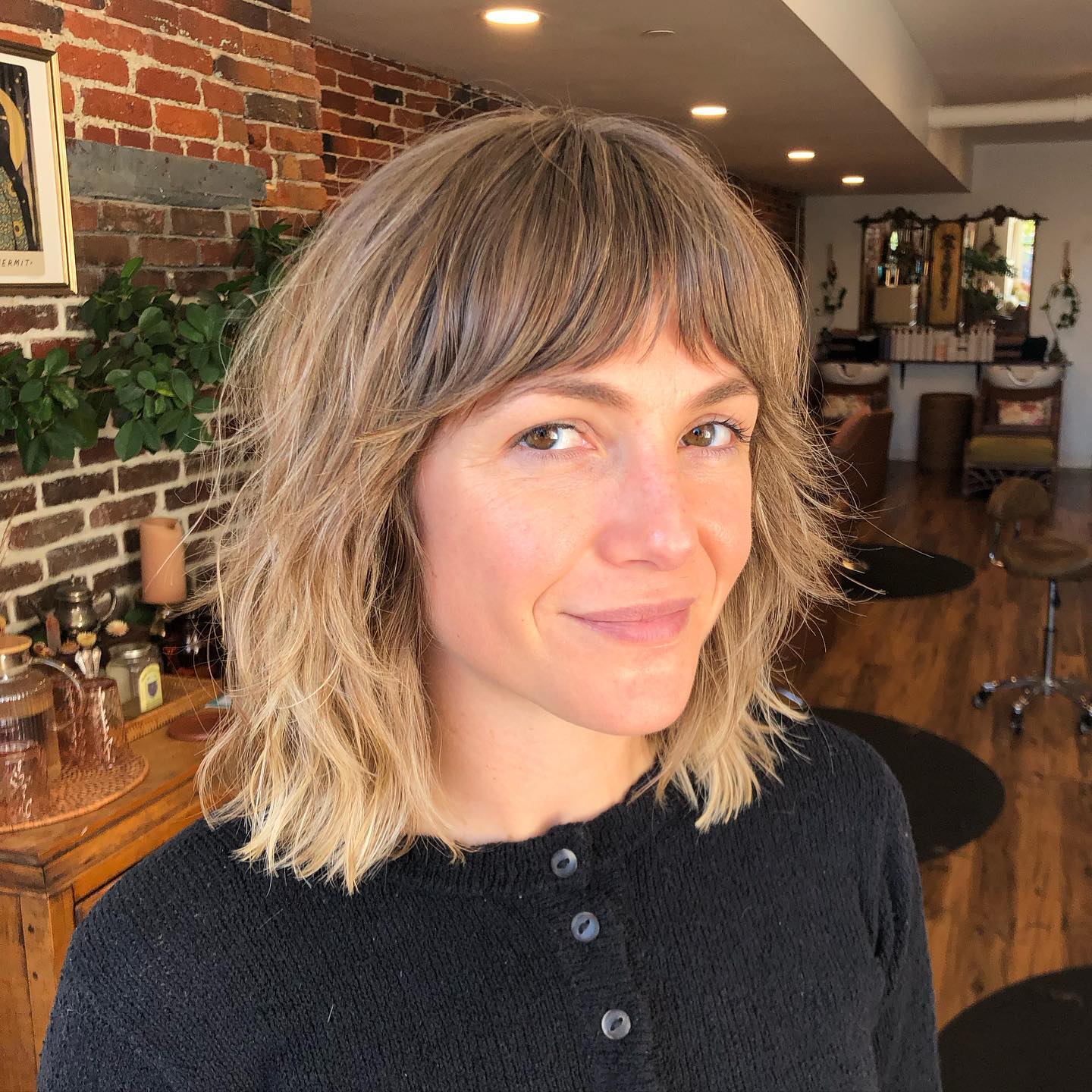 Textured Shag With Wispy Bangs On Mid Length Layers