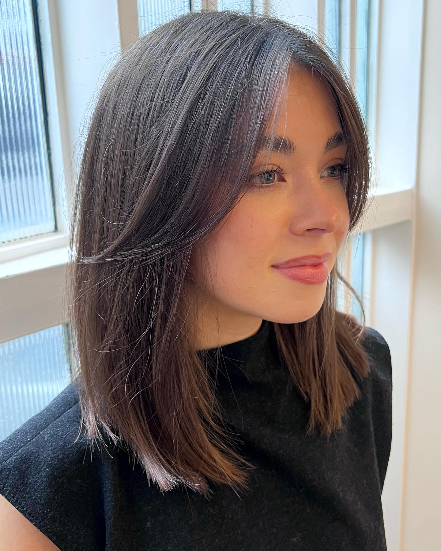 Polished Mid Length Cut With Soft Curtain Bangs