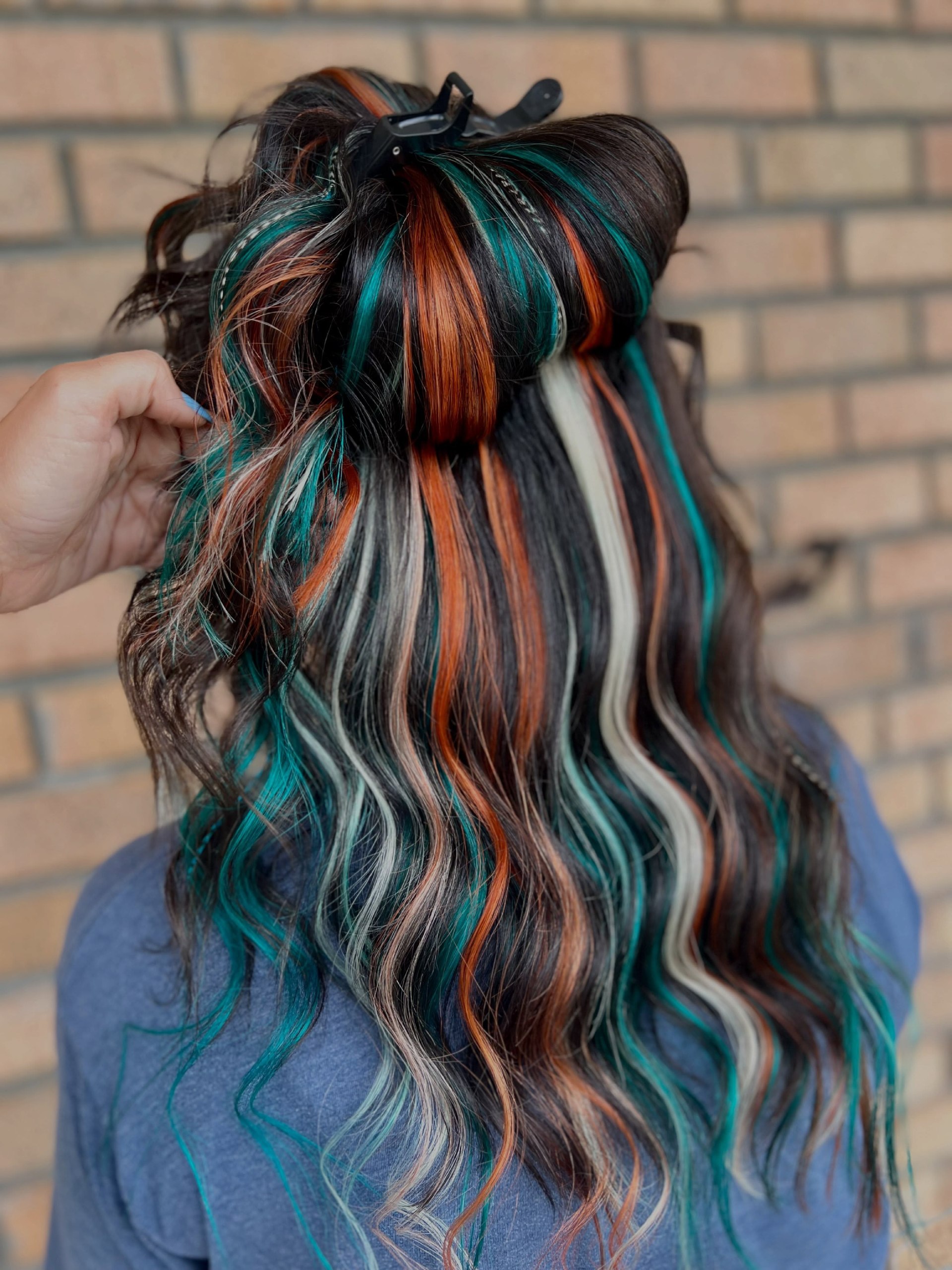 Bold Teal, Copper, and White Streaks In Wavy Hair