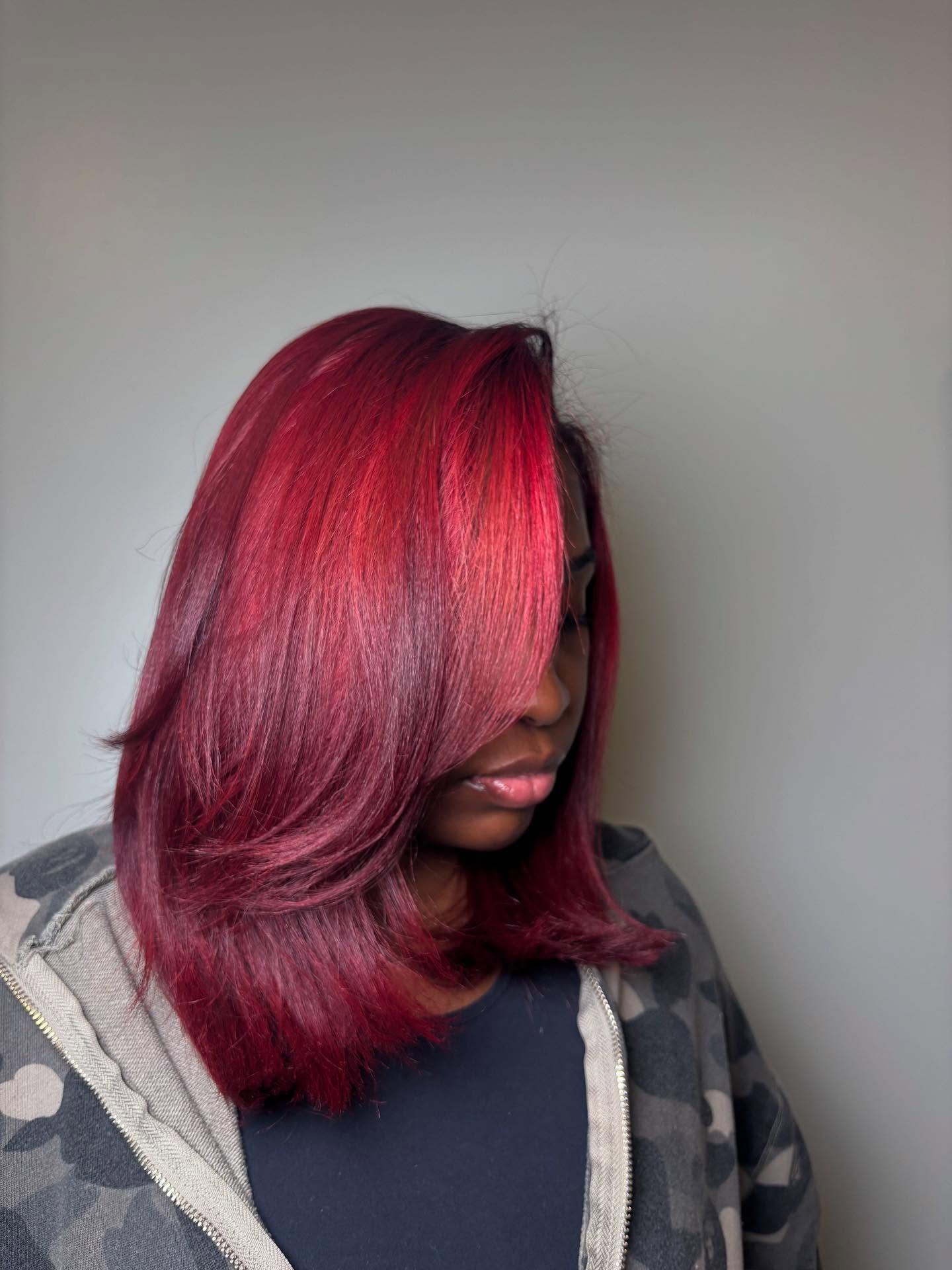 Crimson Cherry Silk Press With Face Framing Layers
