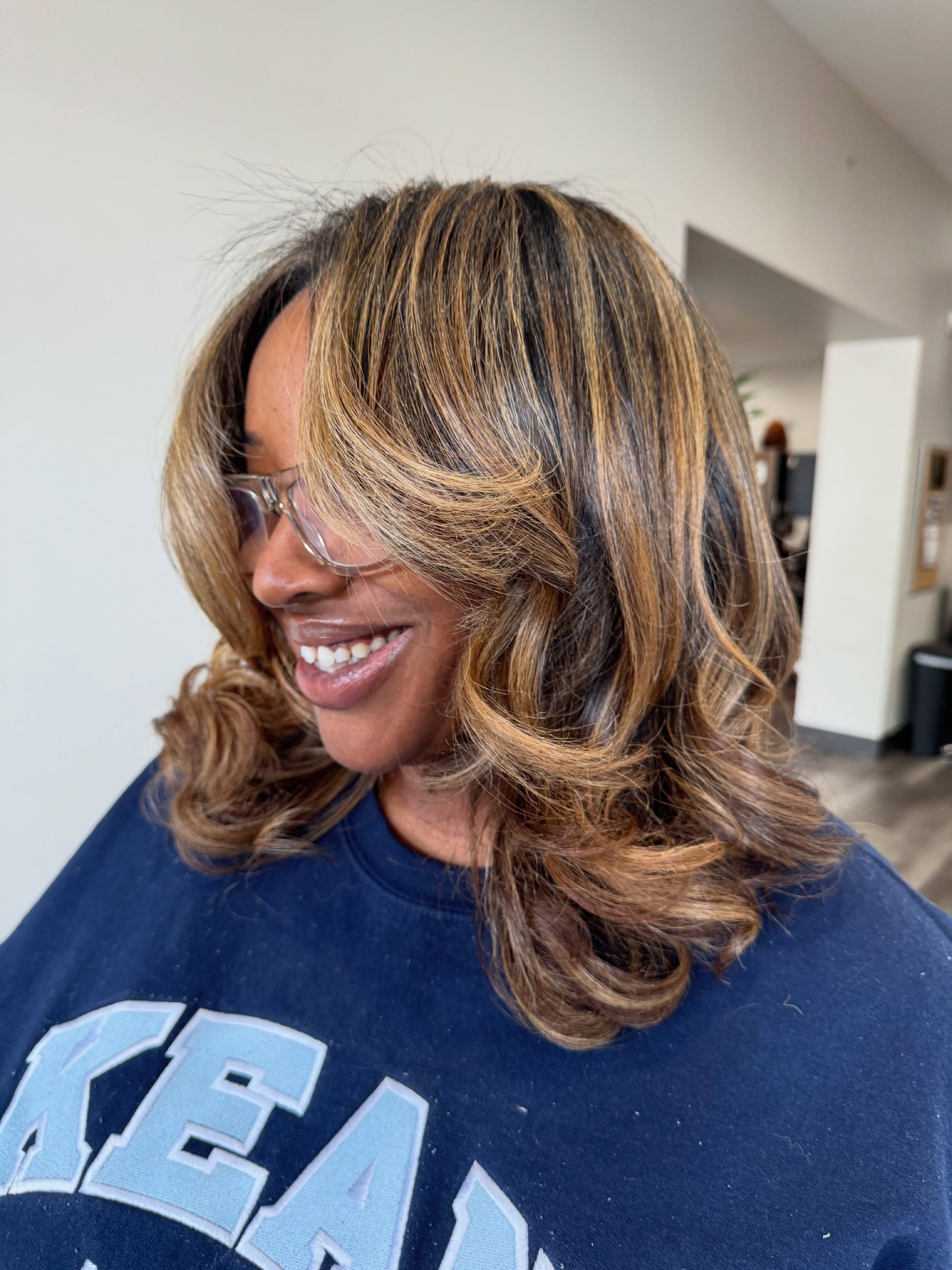 Rich Honey Blonde Balayage With Voluminous Blowout