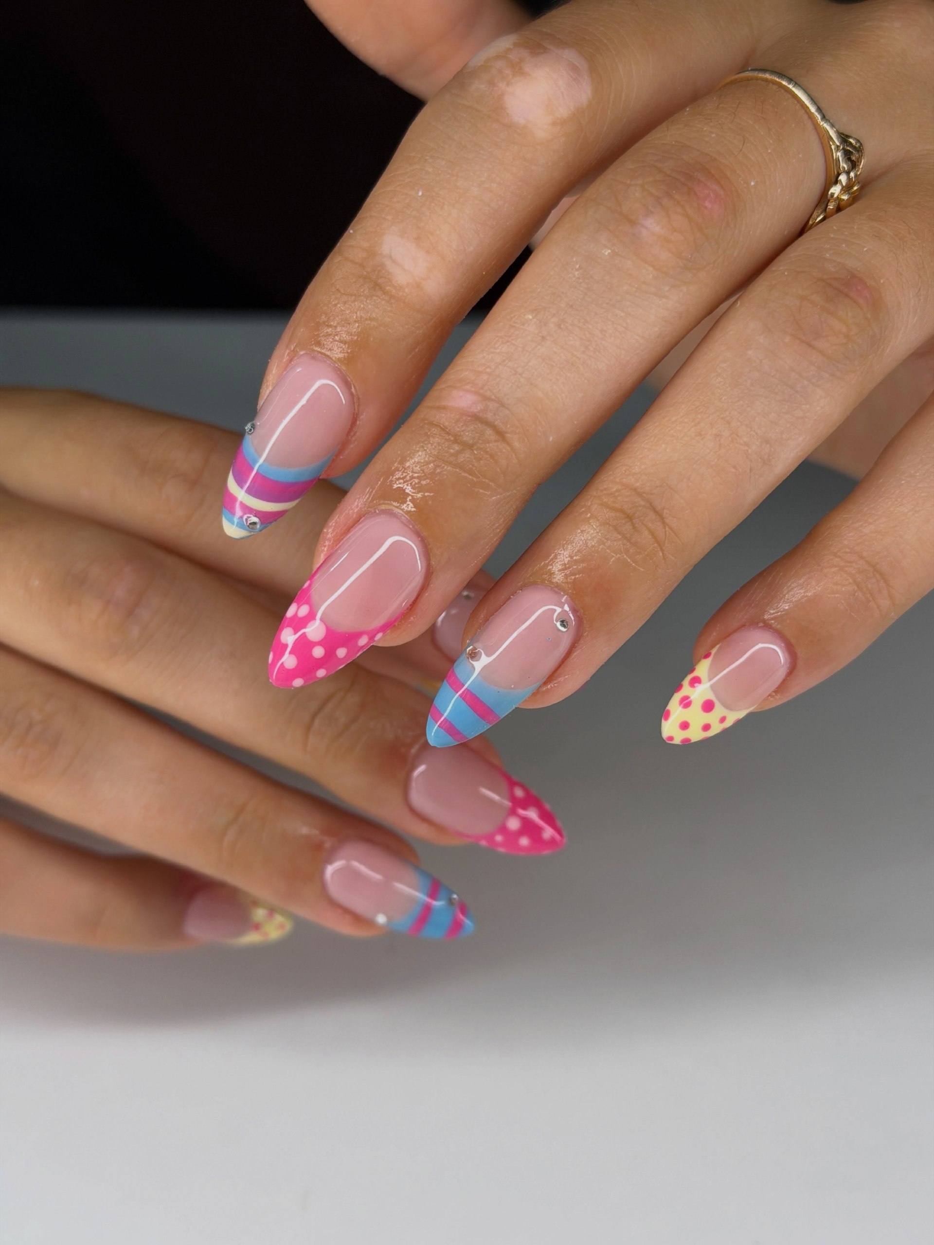 Playful Pastel Almond French Tips with Polka Dots