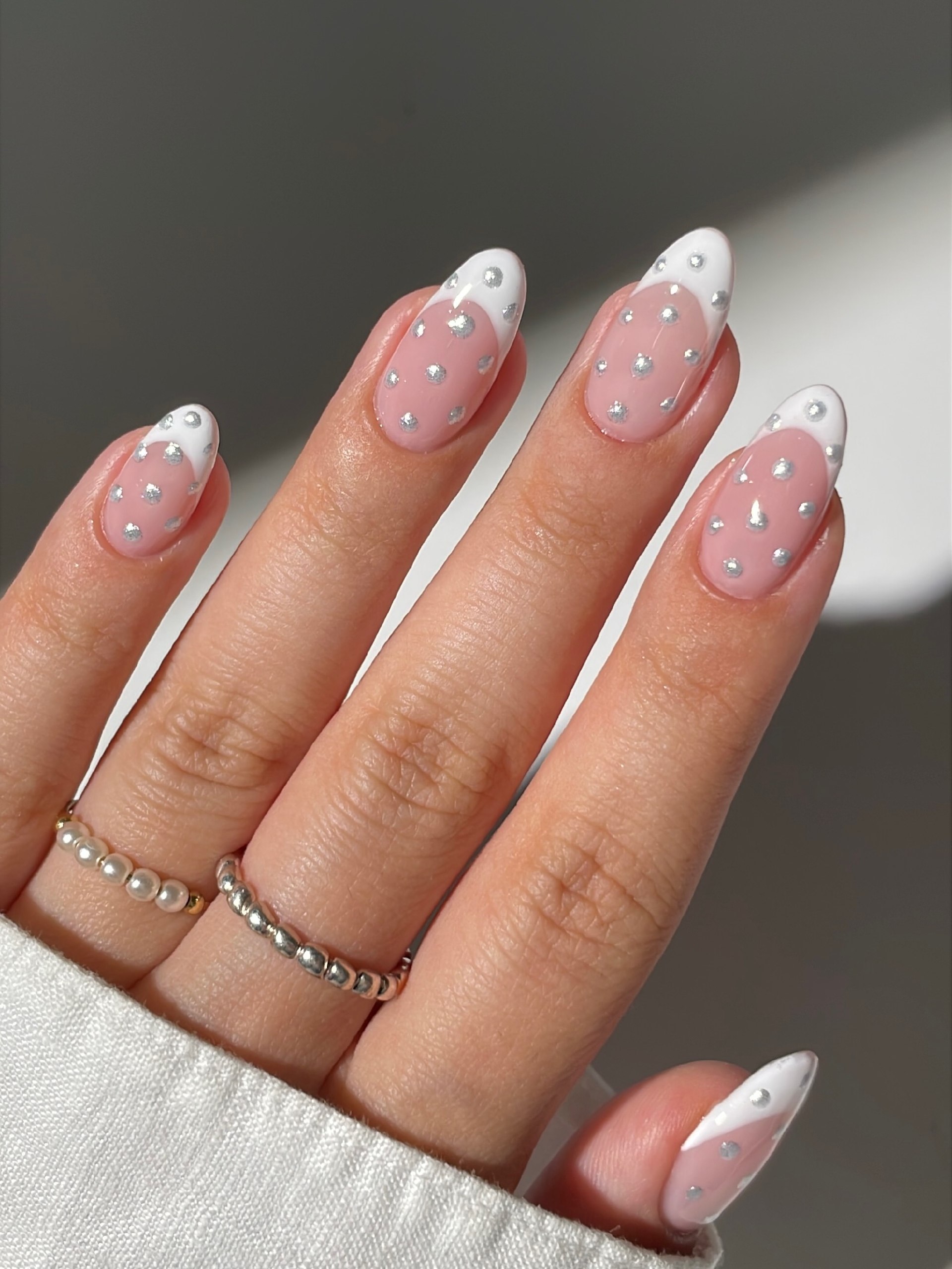 Playful Polka Dot French Almond Nails