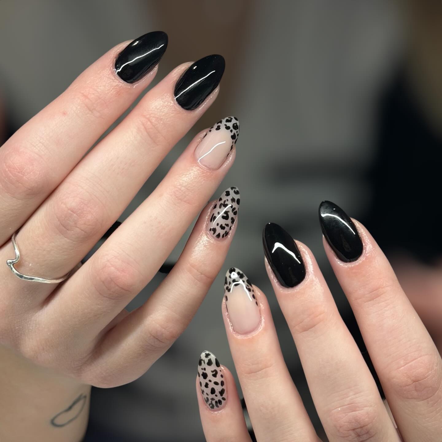Glossy Black Almond Nails with Leopard French Tips